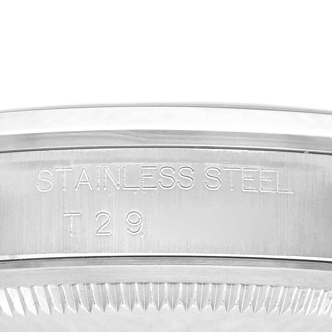 The image shows a close-up of the side of a Rolex Explorer 14270 Men's Stainless Steel Black Dial 14270 Men's Stainless Steel Black Dial watch, highlighting the "Stainless Steel" engraving.