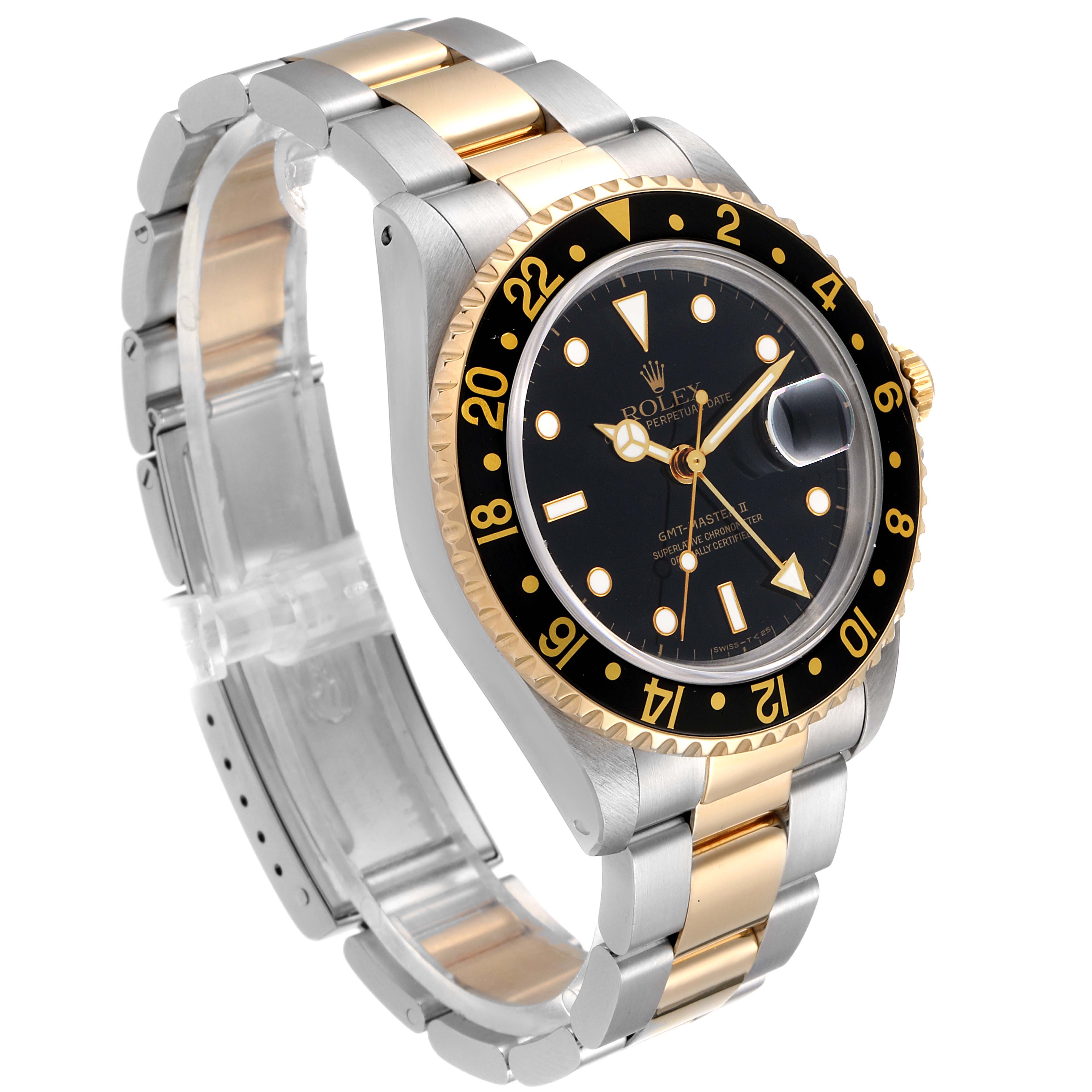 The Rolex GMT-Master 16713 Men's Steel and Gold (two tone) Black Dial 16713 Men's Steel and Gold (two tone) Black Dial watch is shown at a slight angle, displaying the face, bezel, crown, and two-tone bracelet.