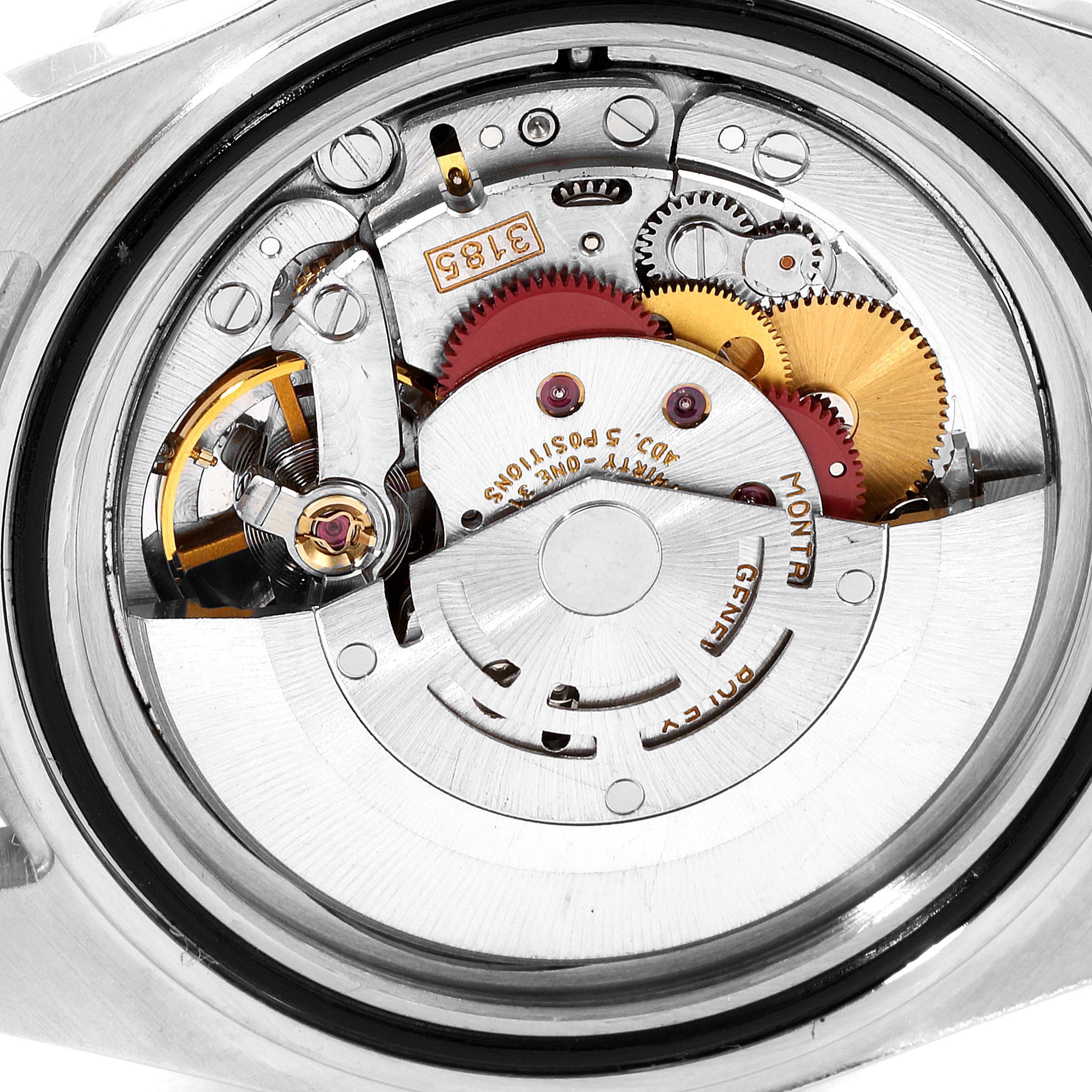 The image shows the intricate internal mechanical movement of a Rolex GMT-Master 16713 Men's Steel and Gold (two tone) Black Dial 16713 Men's Steel and Gold (two tone) Black Dial watch from the back.