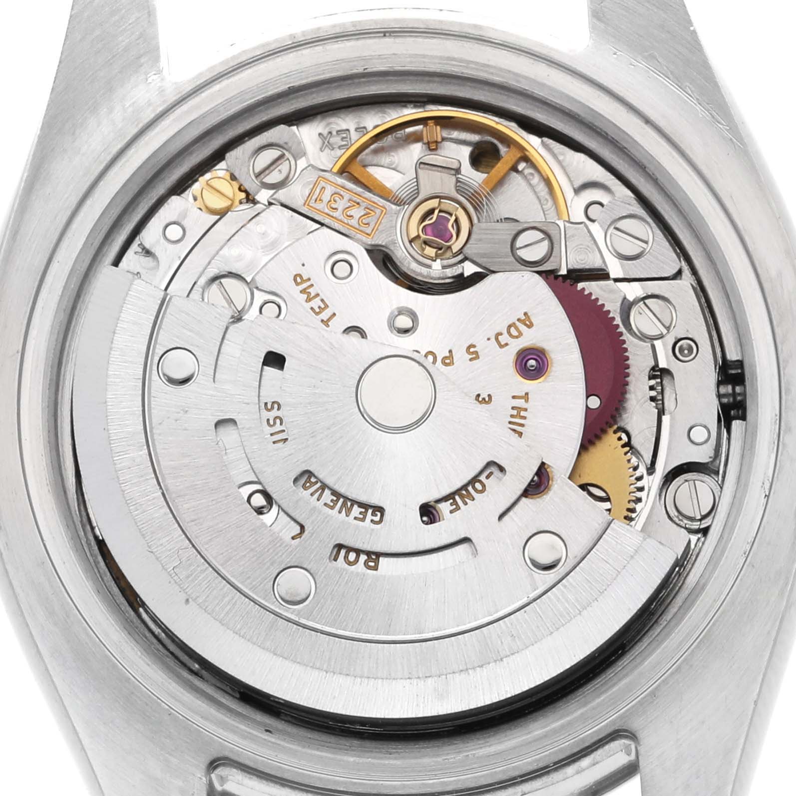 The image shows the back view of the Rolex Oyster Perpetual 176200 Women's Stainless Steel Black Dial 176200 Women's Stainless Steel Black Dial, highlighting its intricate movement components.