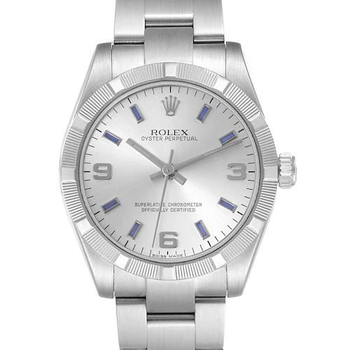 The Rolex mid-size model is shown from the front, displaying the face, bezel, and part of the bracelet.