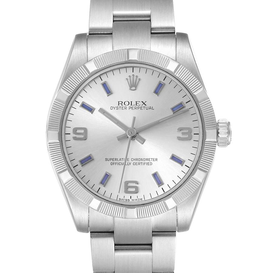 The Rolex Oyster Perpetual Mid-Size watch is shown from the front, displaying the dial, bezel, and part of the bracelet.