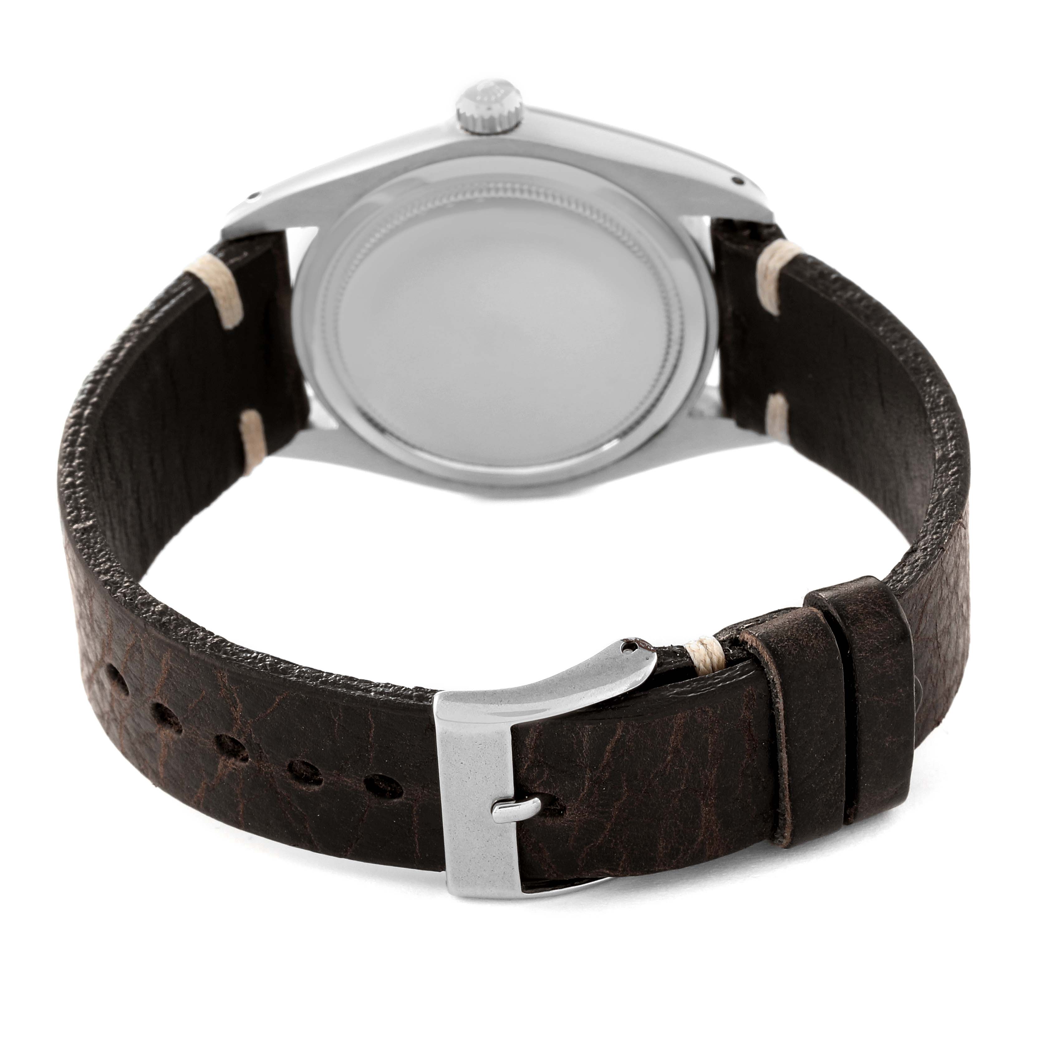 The image shows the back and strap of a Rolex Vintage Collection 6694 Men's Stainless Steel Champagne Dial 6694 Men's Stainless Steel Champagne Dial watch, with a focus on the case back and clasp.