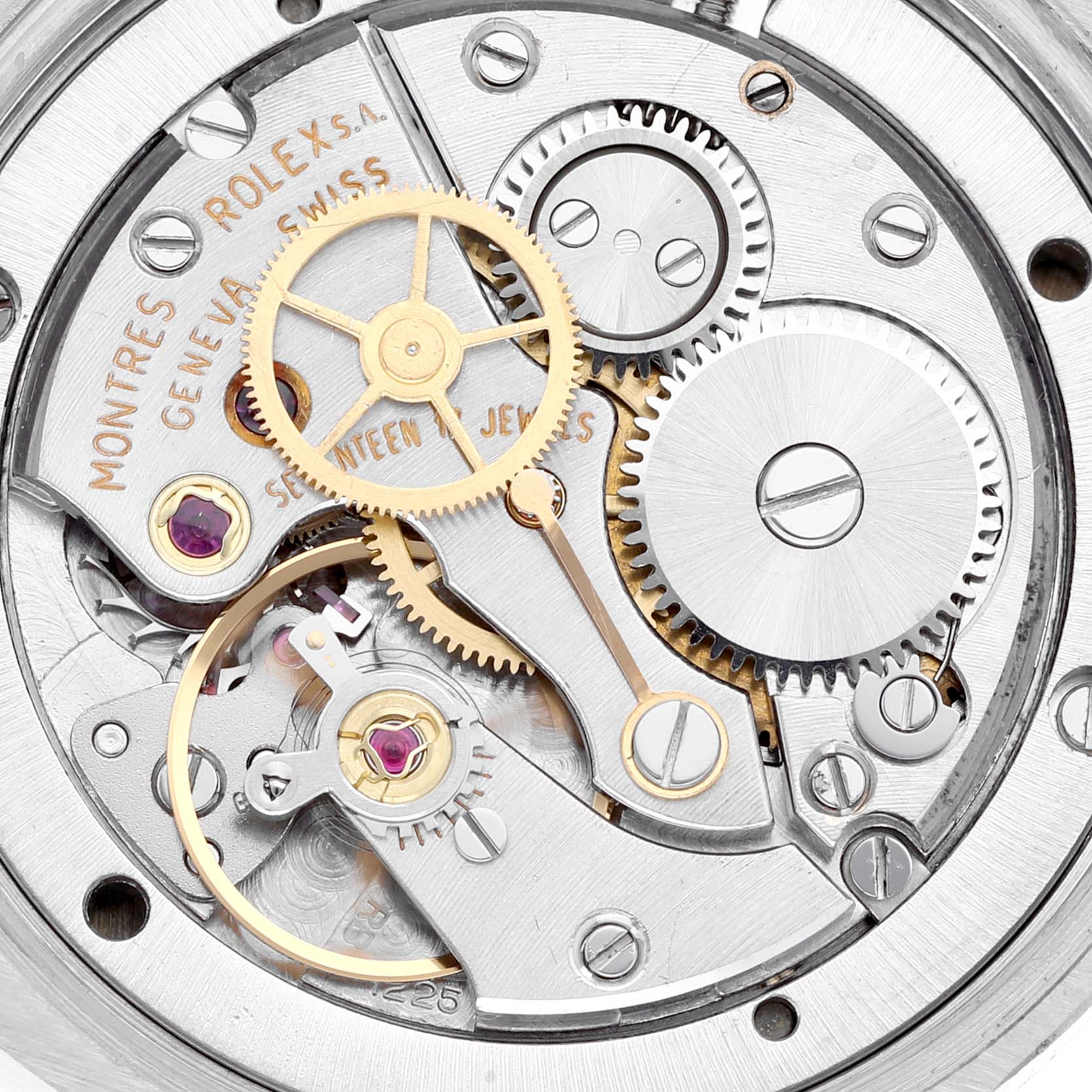 This close-up image showcases the intricate mechanical movement and gears of the Rolex Vintage Collection 6694 Men's Stainless Steel Champagne Dial 6694 Men's Stainless Steel Champagne Dial watch.