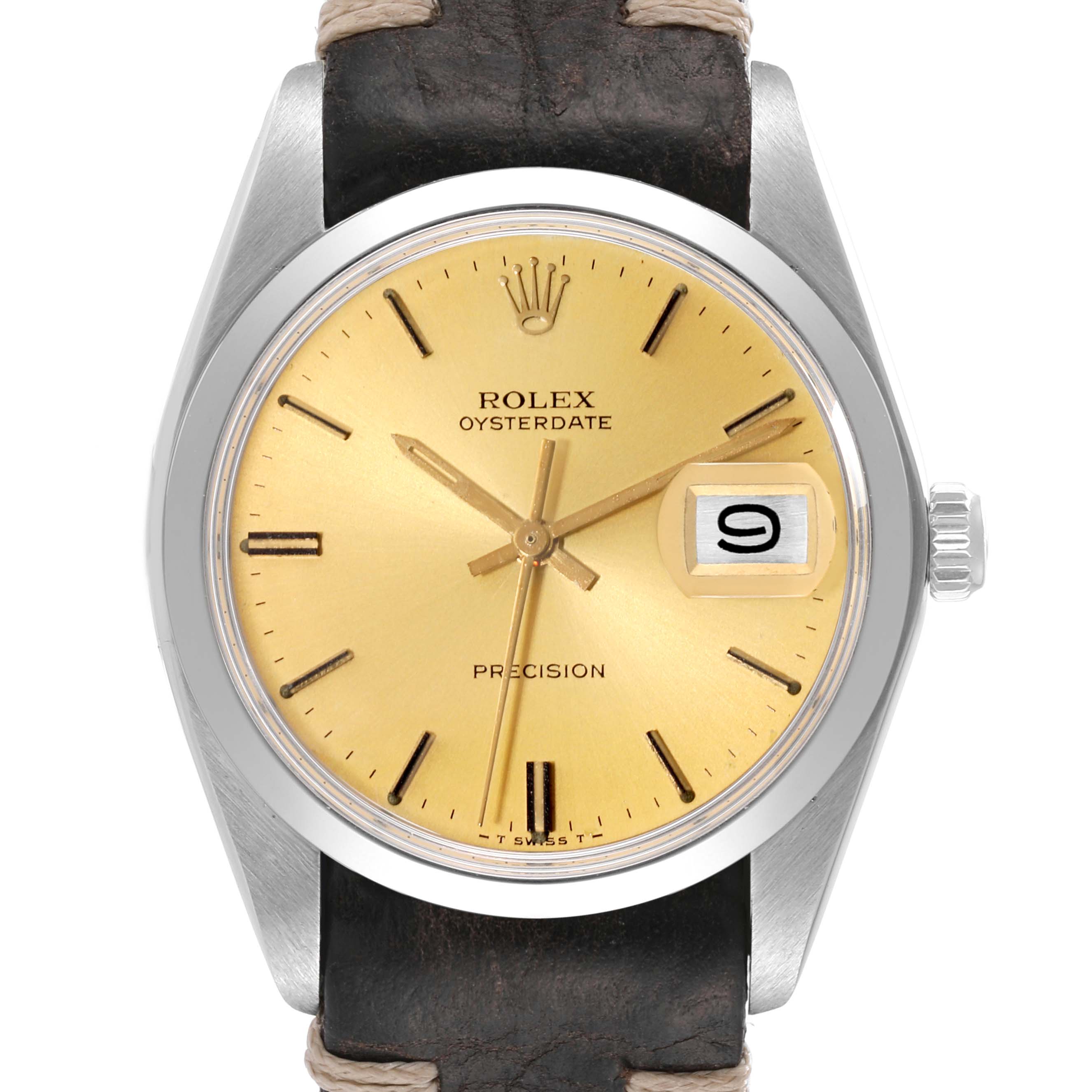 This image shows a front view of the Rolex Vintage Collection 6694 Men's Stainless Steel Champagne Dial 6694 Men's Stainless Steel Champagne Dial model, highlighting its gold dial, date window, and leather strap.