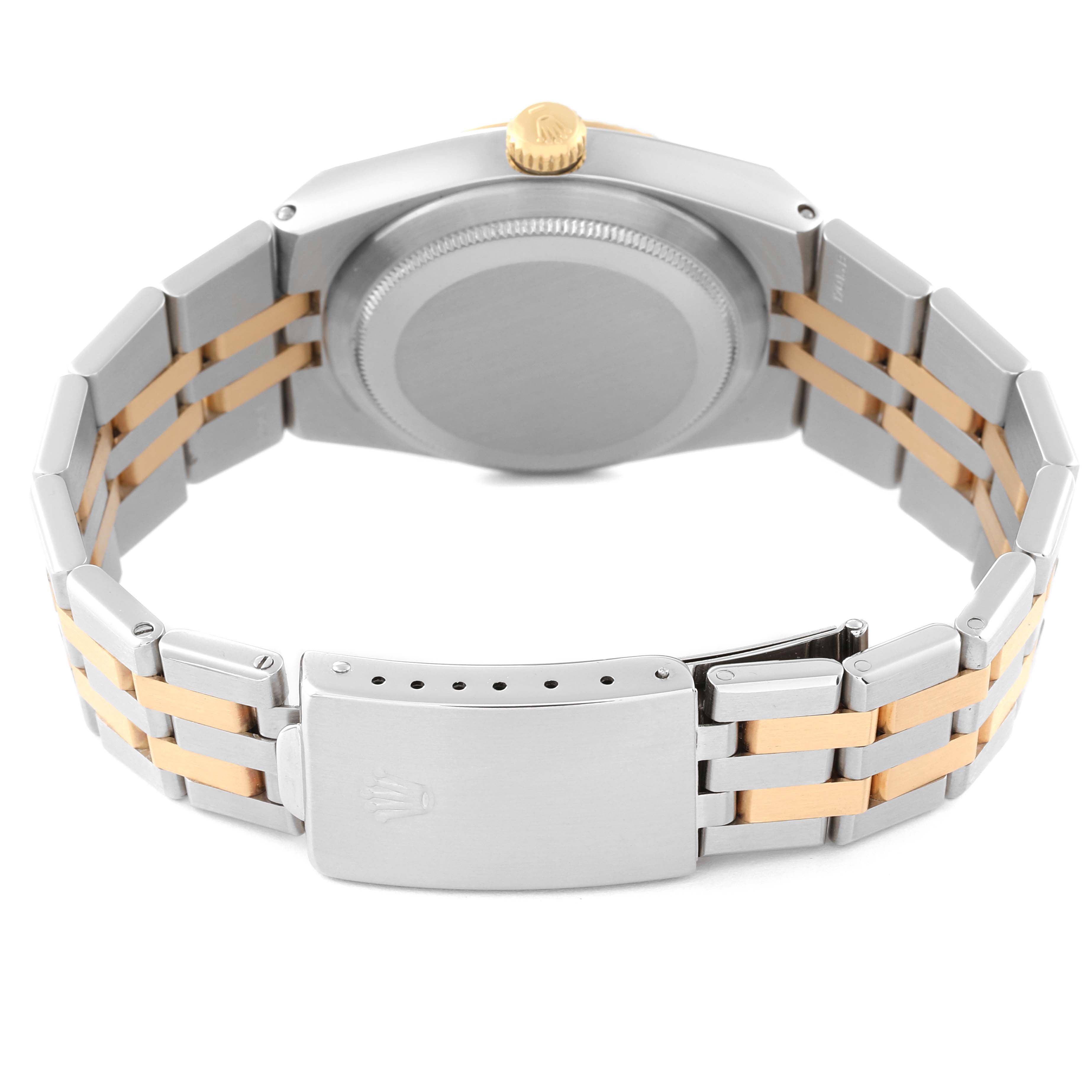 The image shows the back view of the Rolex Oysterquartz 17013 Men
s Steel and Gold (two tone) White Dial 17013 Men
s Steel and Gold (two tone) White Dial watch, featuring the case back, crown, and bracelet with a two-tone design.