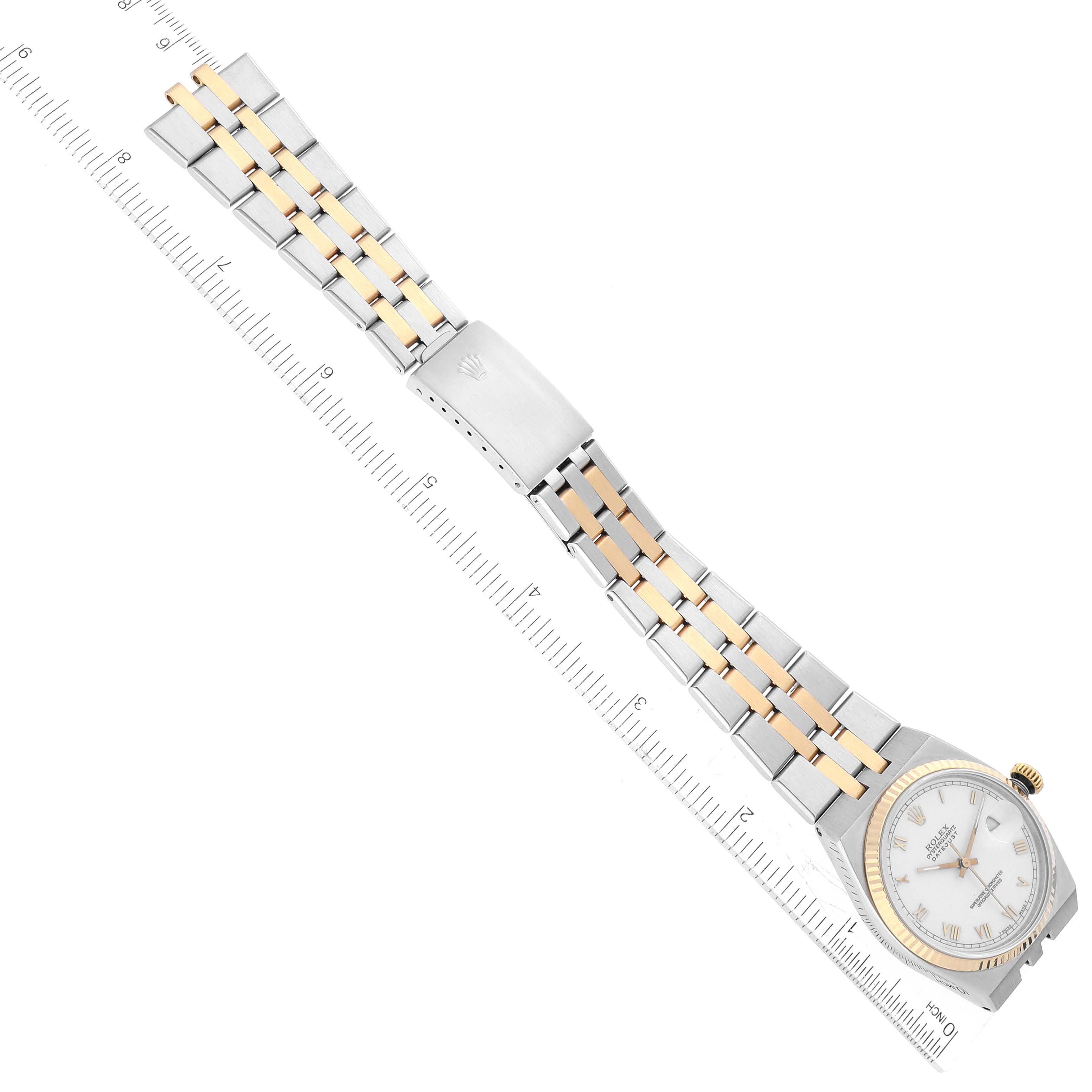 This image shows a top view of the Rolex Oysterquartz 17013 Men
s Steel and Gold (two tone) White Dial 17013 Men
s Steel and Gold (two tone) White Dial watch, including the face, bezel, and two-tone metal bracelet.