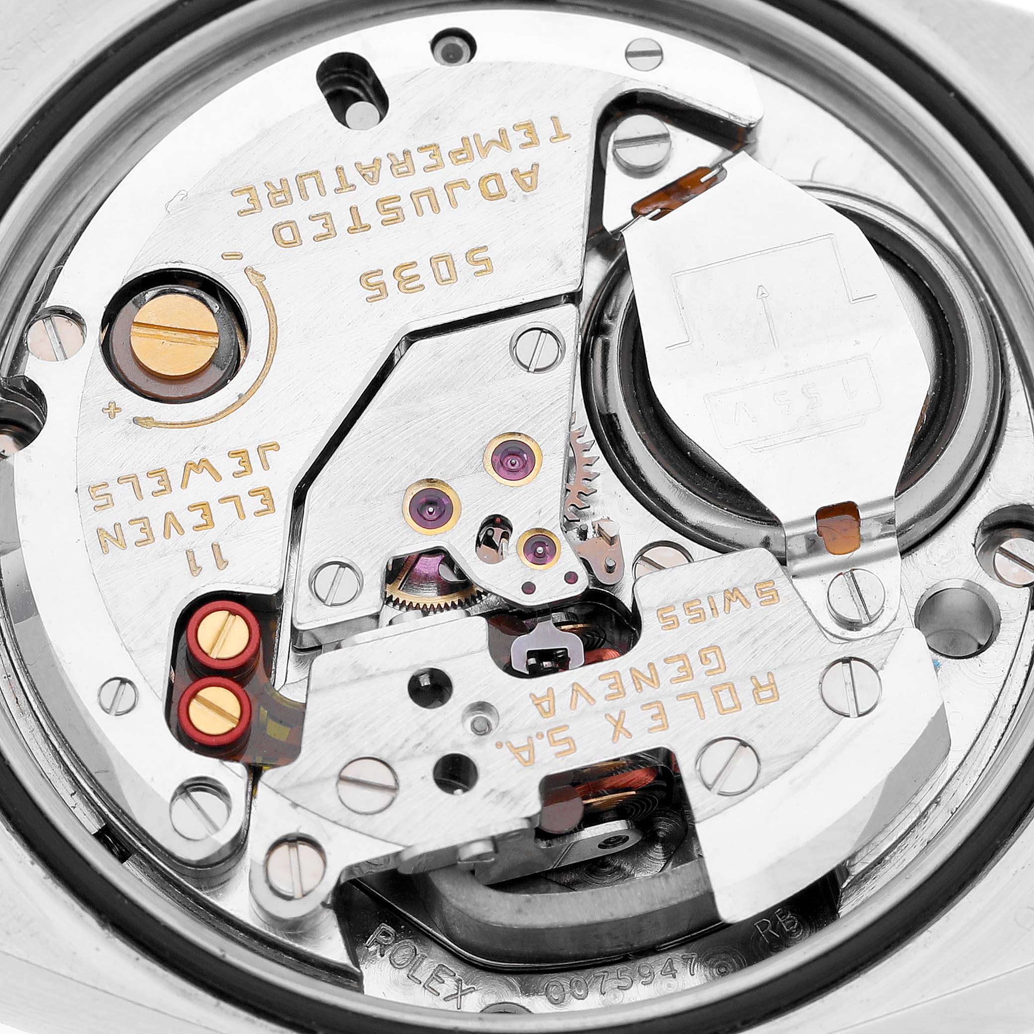 This image shows the intricate internal movement components of the Rolex Oysterquartz 17013 Men
s Steel and Gold (two tone) White Dial 17013 Men
s Steel and Gold (two tone) White Dial watch from a close-up angle.