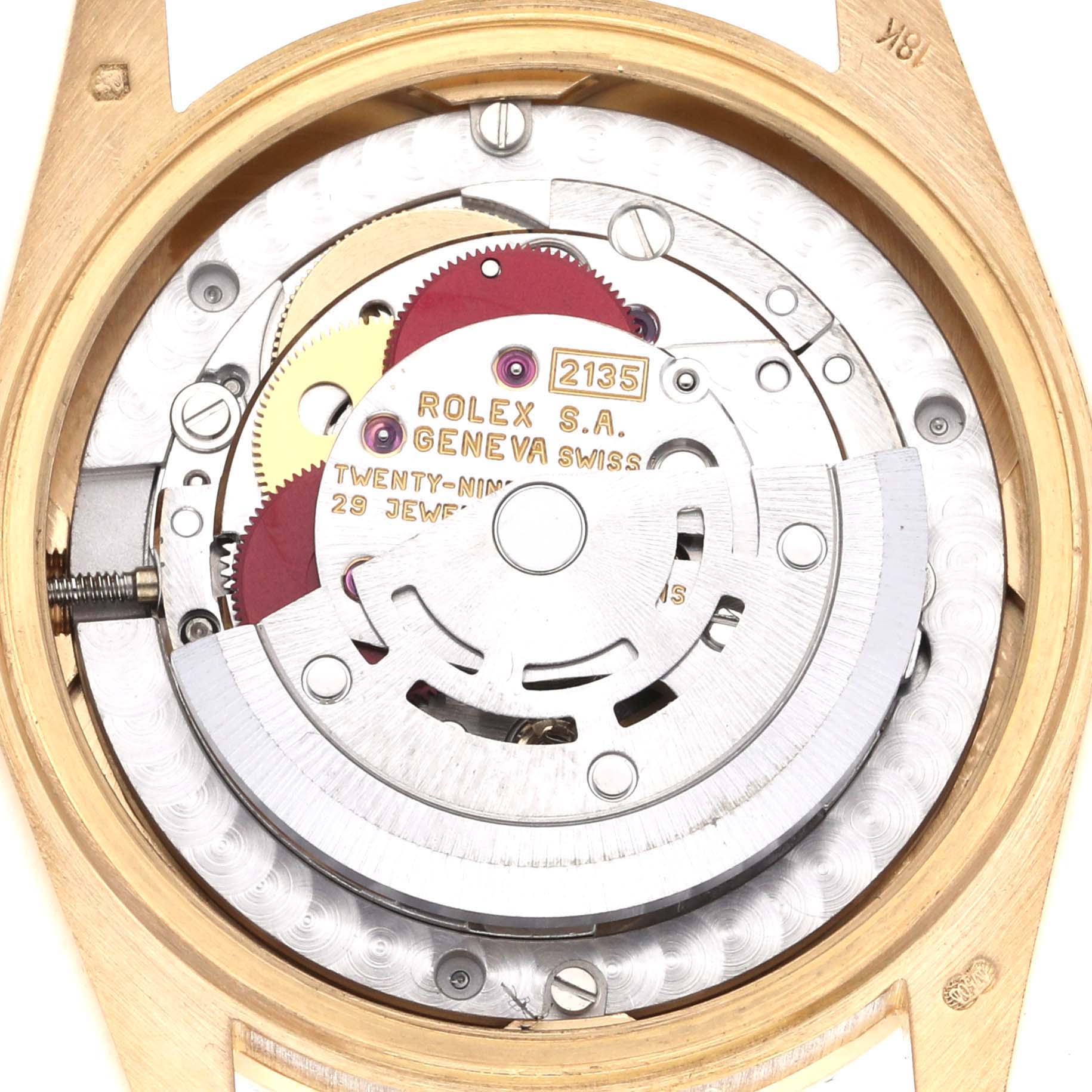 The image shows the internal mechanism of a Rolex President 68288 Women's Yellow Gold Champagne Dial 68288 Women's Yellow Gold Champagne Dial watch from a top-down angle, revealing gears and the rotor.