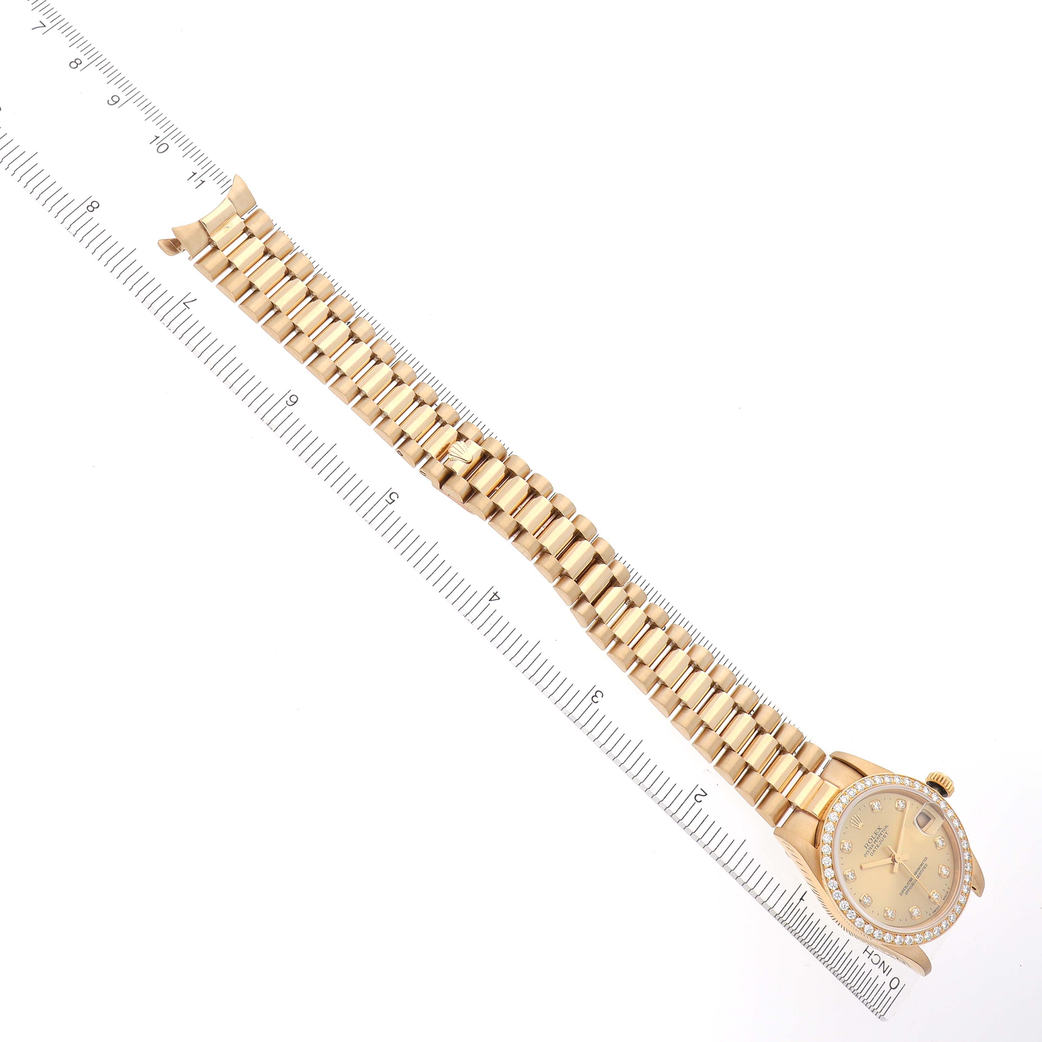 The image shows the Rolex President 68288 Women's Yellow Gold Champagne Dial 68288 Women's Yellow Gold Champagne Dial watch fully extended, highlighting the bracelet and face from a top-down angle with a ruler for scale.