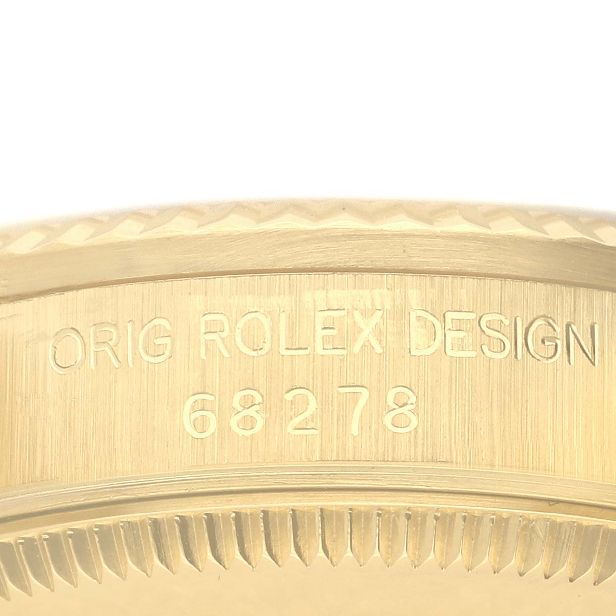 The image shows a close-up of the side engraving on a Rolex President 68278 Women's Yellow Gold Blue Dial 68278 Women's Yellow Gold Blue Dial watch case, emphasizing "Orig Rolex Design" and model number.