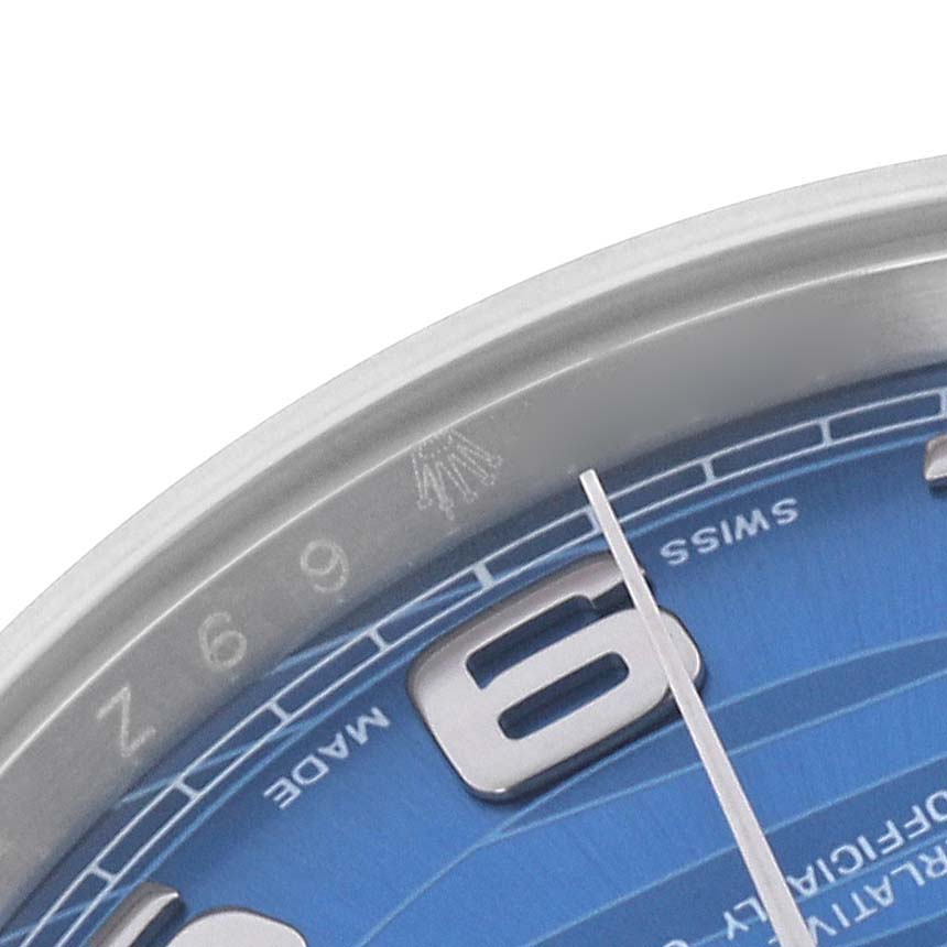 The image shows a close-up of the dial and bezel of a Rolex President 118239 Men's White Gold Blue Dial 118239 Men's White Gold Blue Dial watch, highlighting the number 6 and "Swiss Made."
