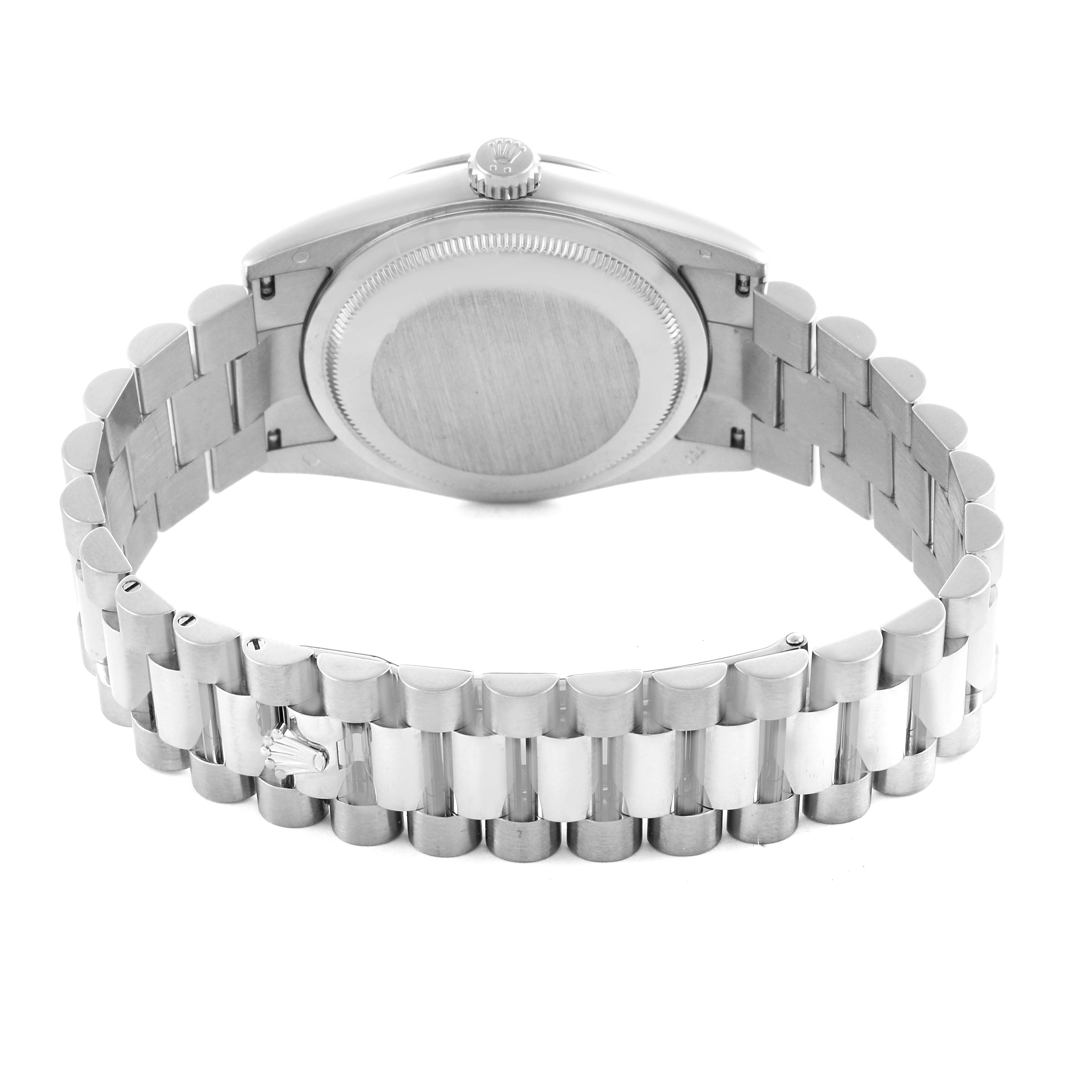 The Rolex President 118239 Men's White Gold Blue Dial 118239 Men's White Gold Blue Dial model is shown from the back, displaying the case back and bracelet.