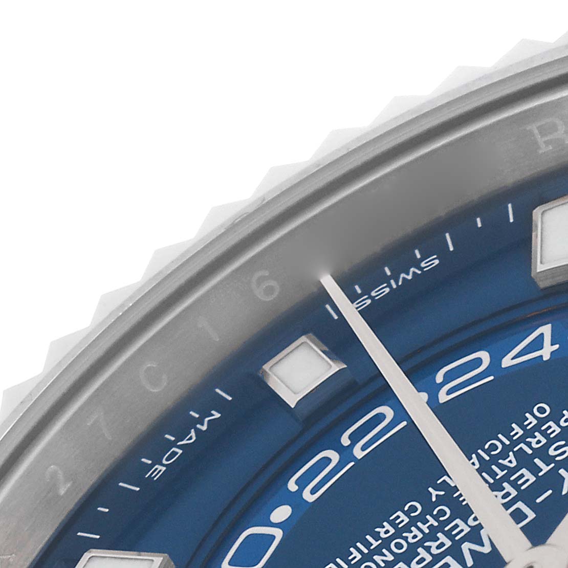 This image shows a close-up of the bezel, dial, and hour markers of the Rolex Sky-Dweller 326934 Men
s Stainless Steel Blue Dial 326934 Men
s Stainless Steel Blue Dial watch.