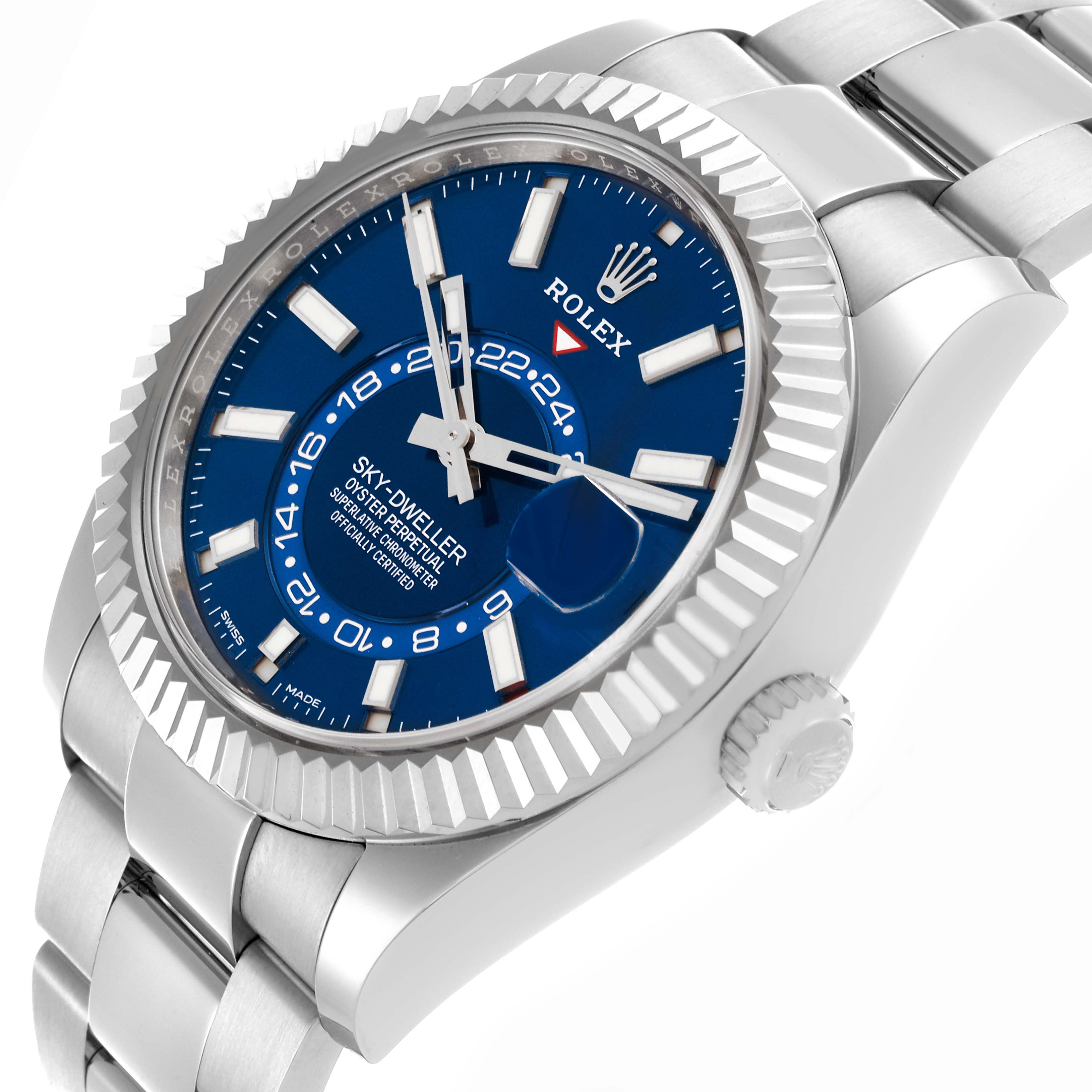 The Rolex Sky-Dweller 326934 Men's Stainless Steel Blue Dial 326934 Men's Stainless Steel Blue Dial watch is shown at a three-quarter angle, highlighting the blue dial, fluted bezel, and Oyster bracelet.
