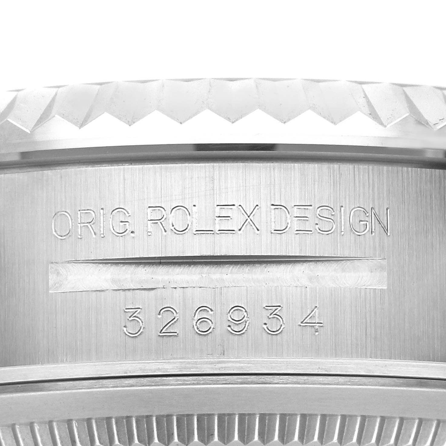 The image shows a close-up of the case side of the Rolex Sky-Dweller 326934 Men's Stainless Steel Blue Dial 326934 Men's Stainless Steel Blue Dial, highlighting the design engraving and model number.