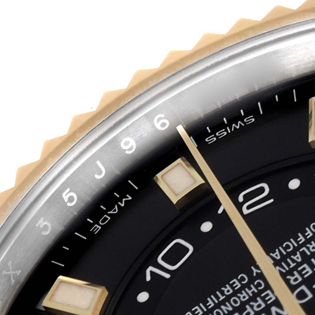The image shows a close-up of the dial and fluted bezel of a Rolex Sky-Dweller 326933 Men's Steel and Gold (two tone) Black Dial 326933 Men's Steel and Gold (two tone) Black Dial watch.
