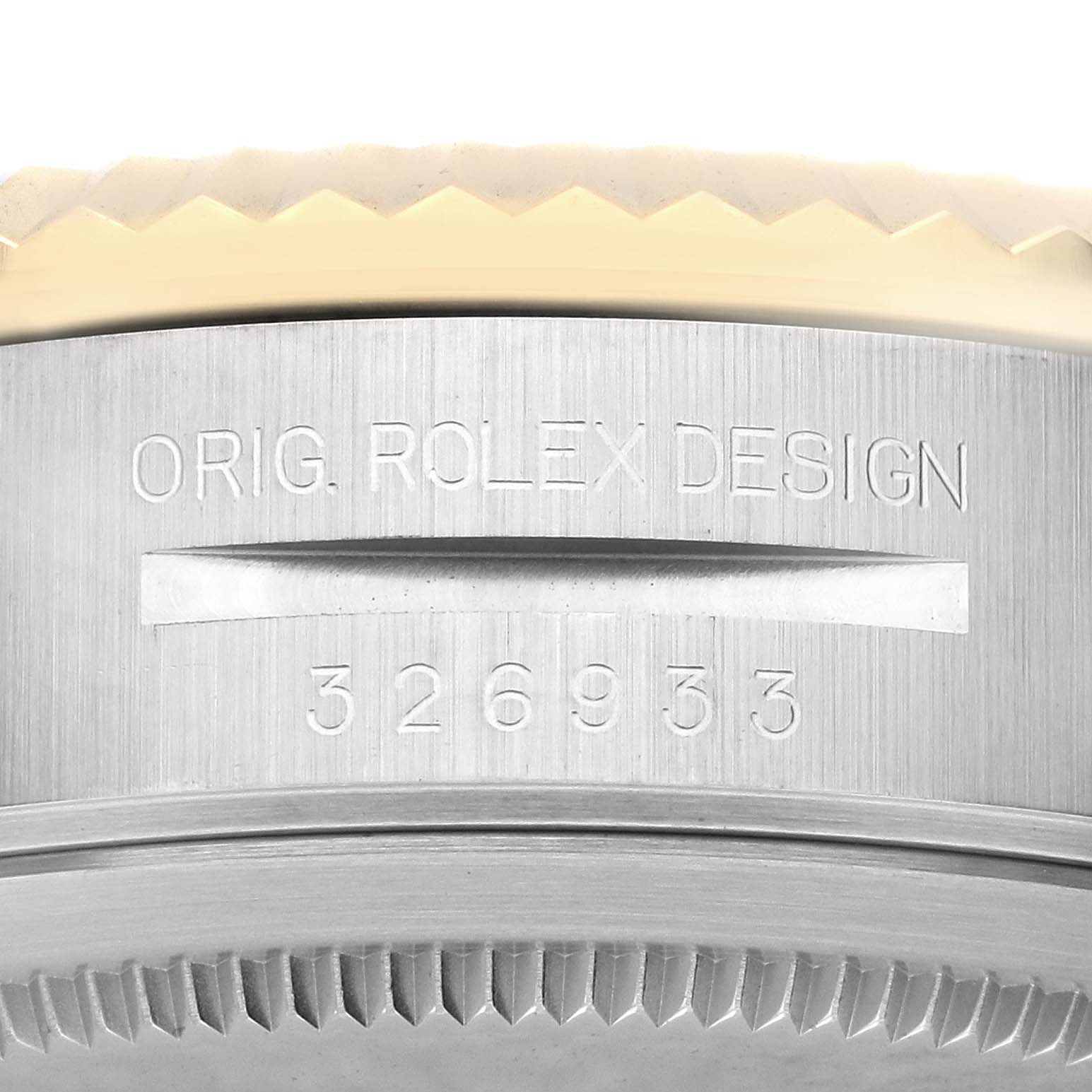 The image shows a close-up of the case back edge of a Rolex Sky-Dweller 326933 Men's Steel and Gold (two tone) Black Dial 326933 Men's Steel and Gold (two tone) Black Dial, highlighting its design and model number.