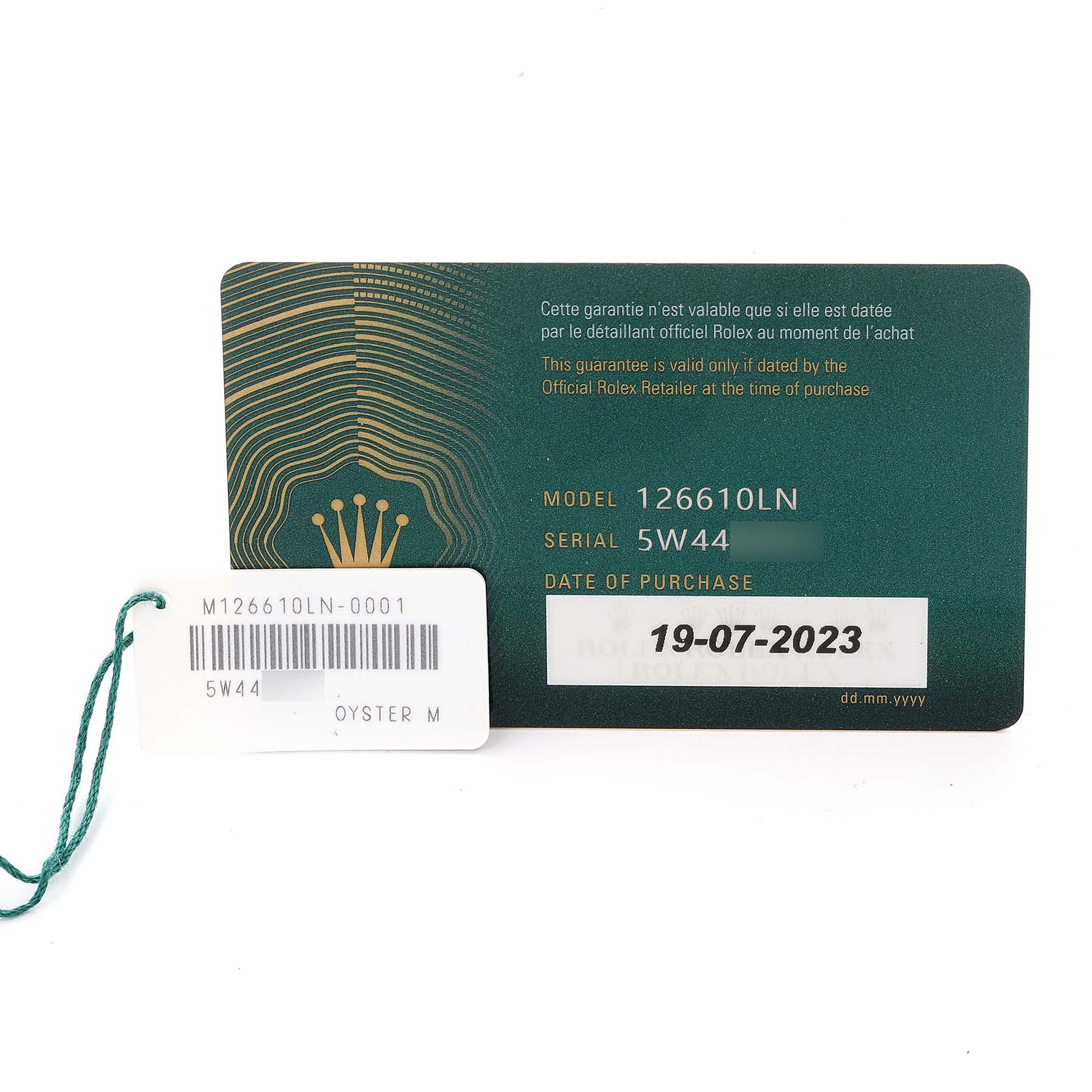 The image shows a Rolex Submariner 126610LN Men
s Stainless Steel Black Dial 126610LN Men
s Stainless Steel Black Dial warranty card and tag with model details.