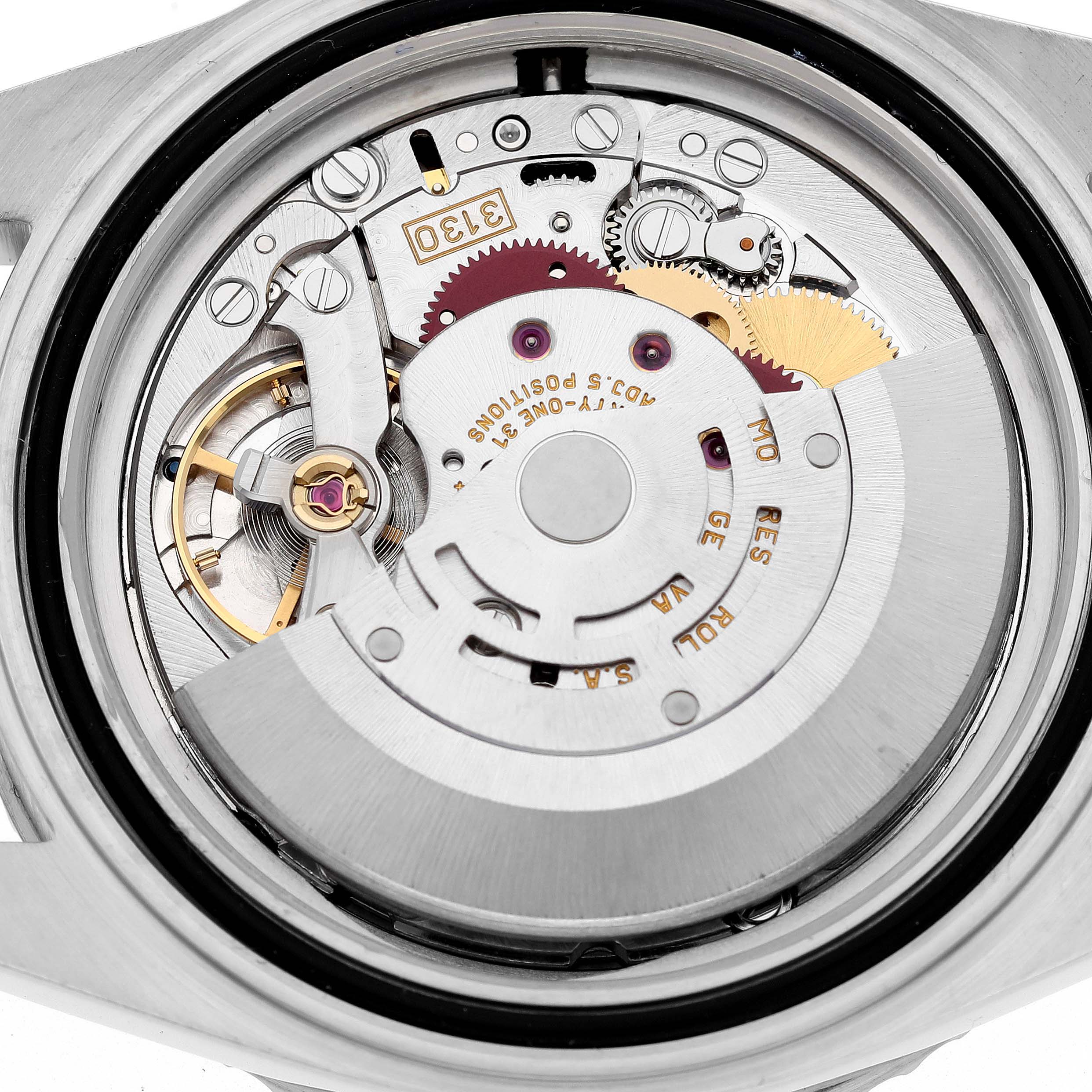 The image shows the internal mechanism of a Rolex Submariner 14060M Men
s Stainless Steel Black Dial 14060M Men
s Stainless Steel Black Dial watch from a close-up, rear angle view.