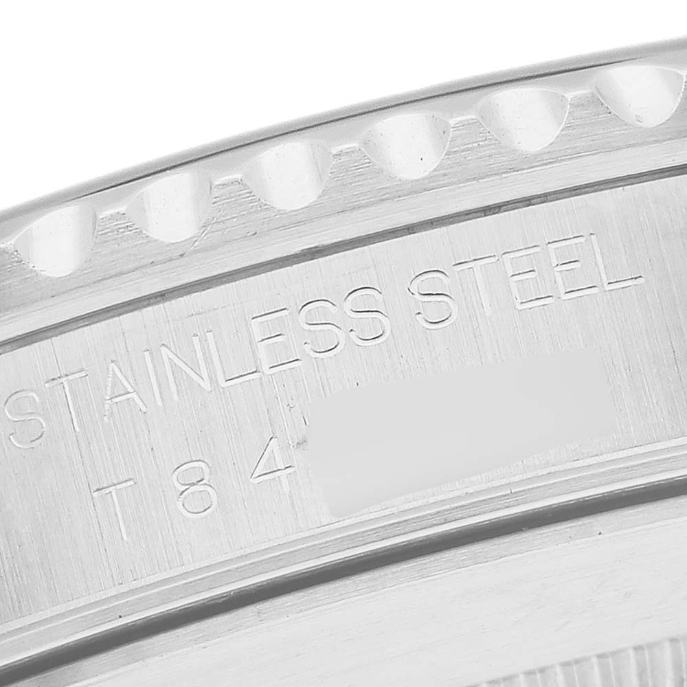 This close-up image shows the case back of a Rolex Submariner 14060 Men
s Stainless Steel Black Dial 14060 Men
s Stainless Steel Black Dial, highlighting its stainless steel material.