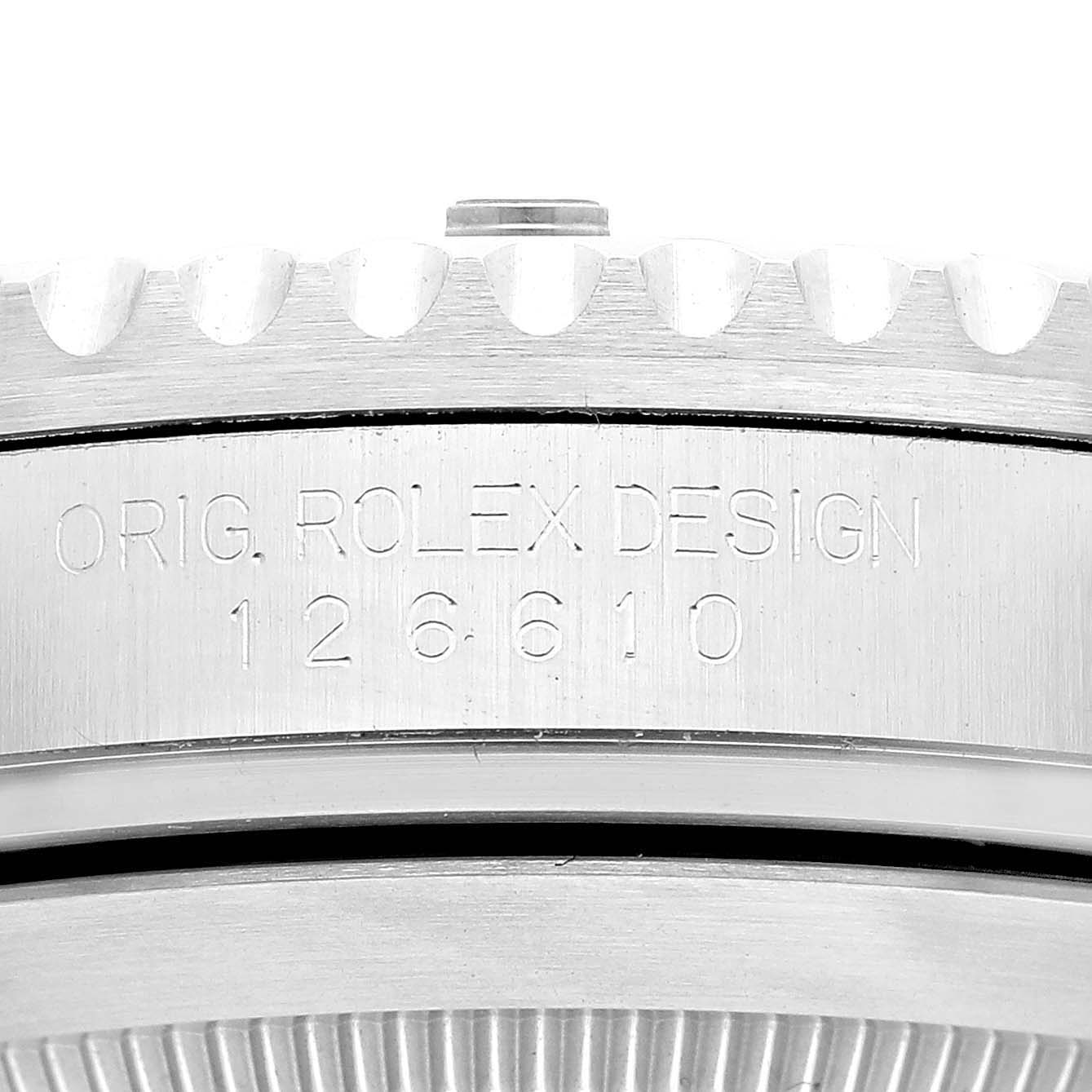 This image shows a close-up of the engraving on the case side of a Rolex Submariner 126610LV Men's Stainless Steel Black Dial 126610LV Men's Stainless Steel Black Dial watch, displaying the words "ORIG. ROLEX DESIGN 126610."