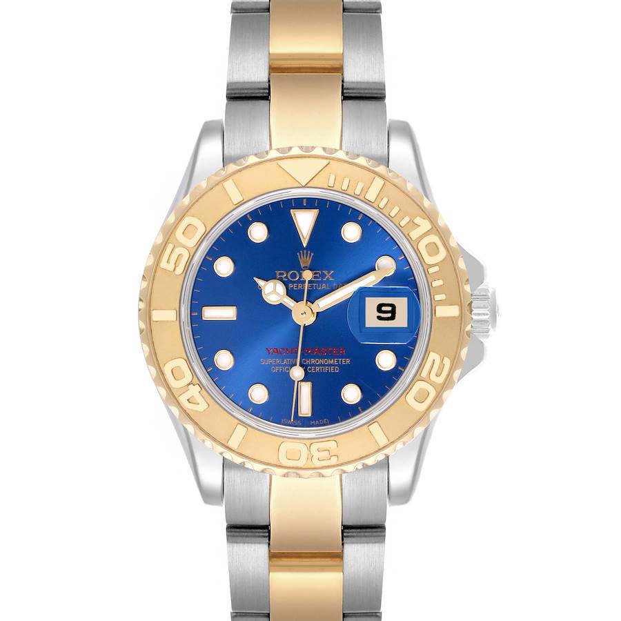 The Rolex Yacht-Master watch is shown from the front, highlighting its blue dial, gold bezel, and two-tone bracelet.