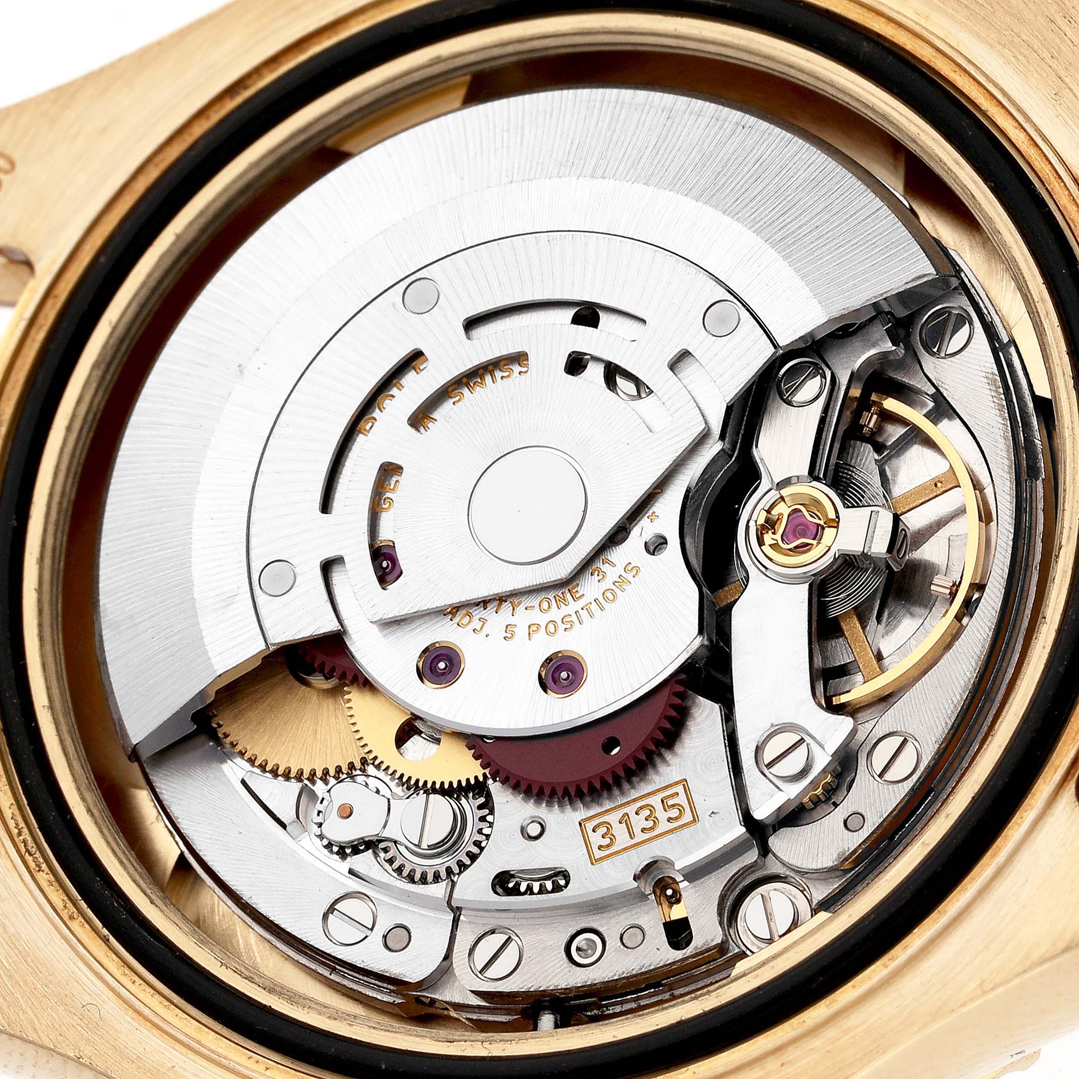 The image shows the internal movement of a Rolex Yacht-Master 16628 Men's Yellow Gold White Dial 16628 Men's Yellow Gold White Dial watch viewed from the back, highlighting the mechanical components.