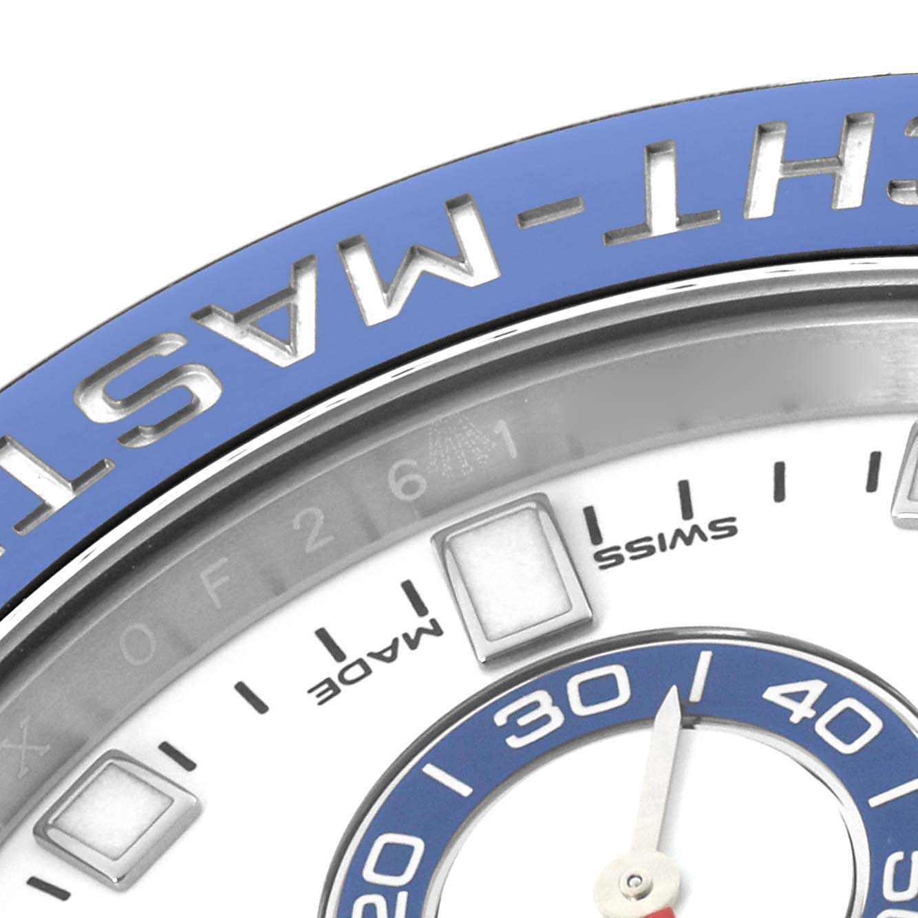 The image shows a close-up of the Rolex Yacht-Master 116680 Men's Stainless Steel White Dial 116680 Men's Stainless Steel White Dial's bezel and watch face with visible hour markers and hand.