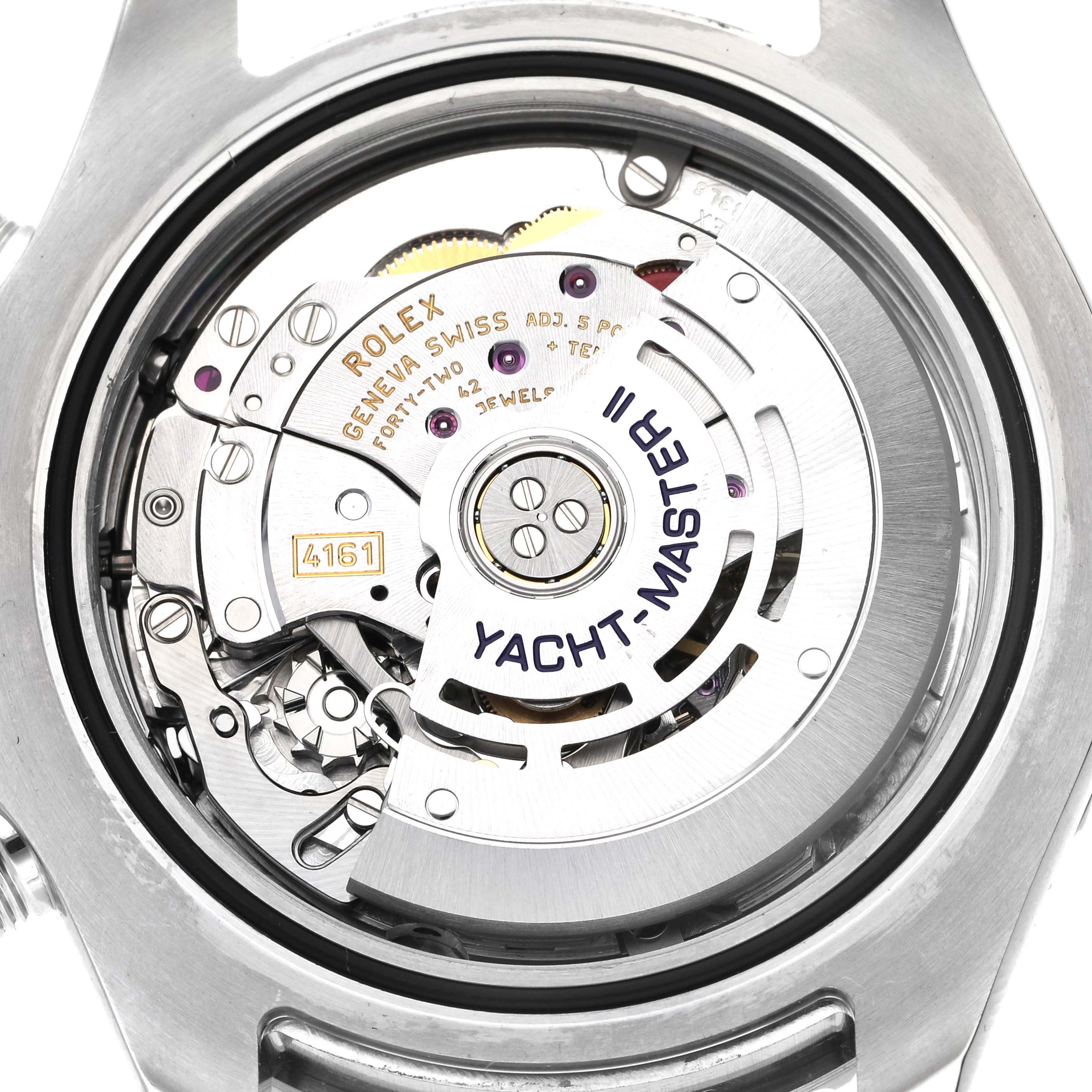 The image shows the back view of the Rolex Yacht-Master 116680 Men's Stainless Steel White Dial 116680 Men's Stainless Steel White Dial watch, highlighting its intricate movement mechanism.