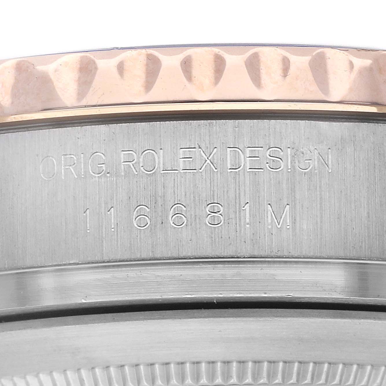 The image shows a close-up side view of the bezel and casing of a Rolex Yacht-Master 116681M Men's Steel and Gold (two tone) White Dial, revealing the model number and branding.