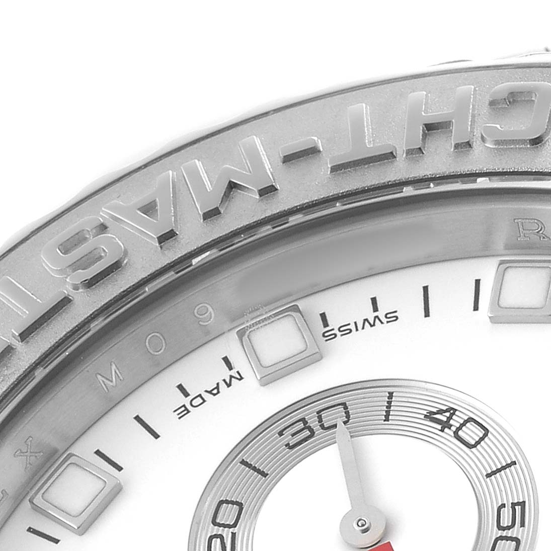 The image shows a close-up of the Rolex Yacht-Master 116689M Men's White Gold White Dial's bezel and part of the dial, highlighting the "YACHT-MASTER" engraving.