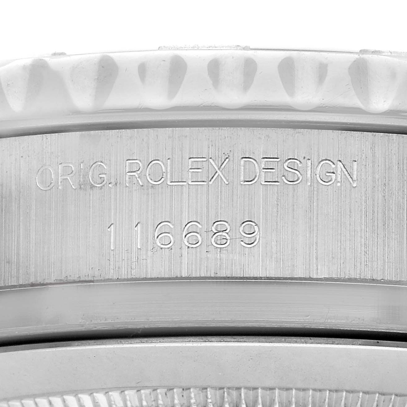 The image shows a close-up of the side of a Rolex Yacht-Master 116689M Men's White Gold White Dial, highlighting the engraved design and model number.
