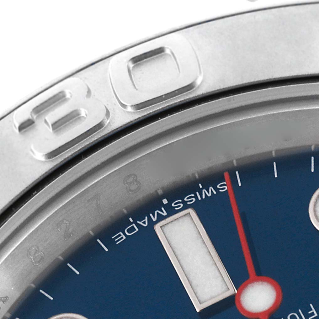 This close-up image of the Rolex Yacht-Master 116622 Men's Stainless Steel Blue Dial 116622 Men's Stainless Steel Blue Dial watch shows part of the bezel with a "30" marking and a portion of the dial.