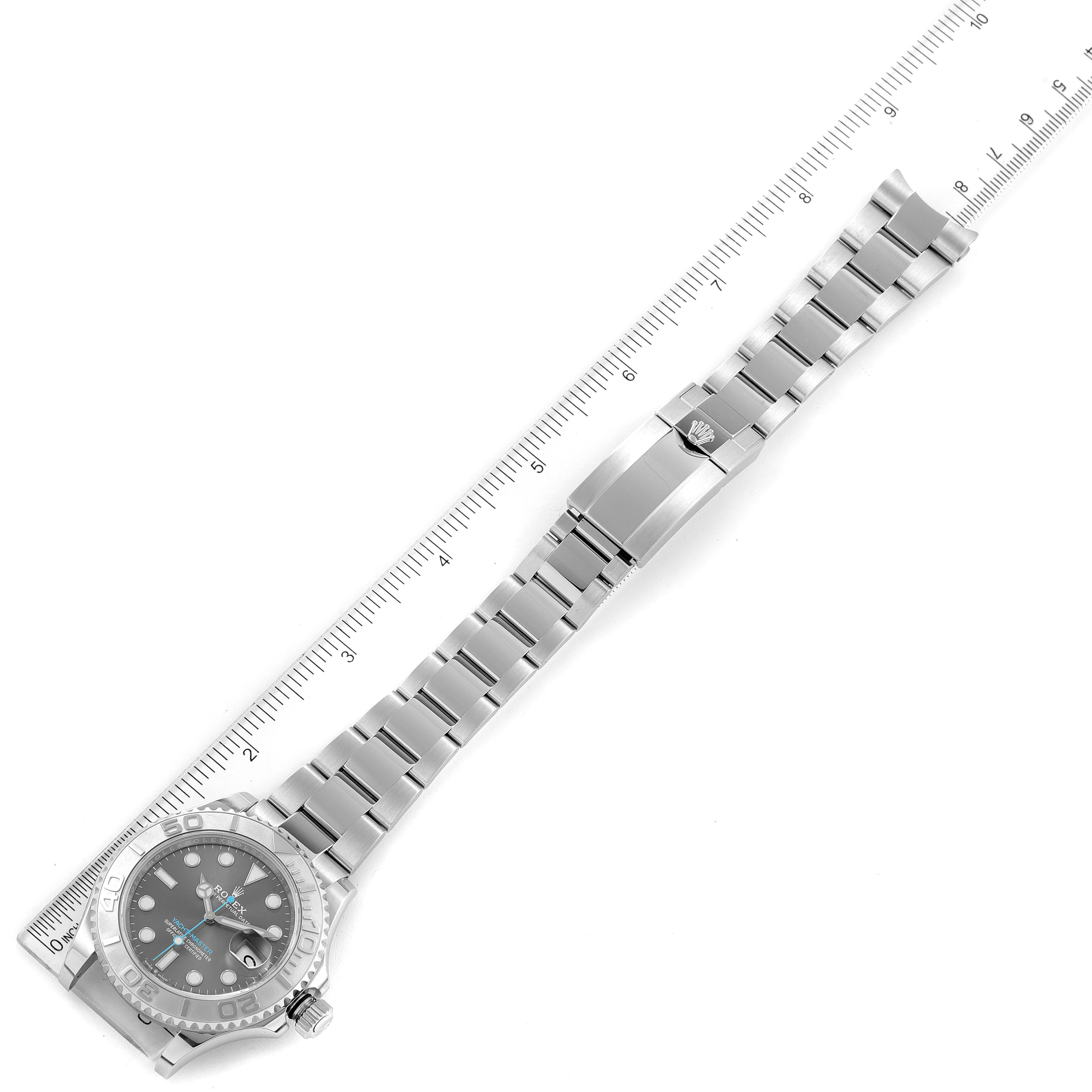 The Rolex Yacht-Master 126622 Men's Platinum Grey Dial 126622 Men's Platinum Grey Dial watch is shown flat, fully extended, with the face on the left and the bracelet aligned with a ruler.