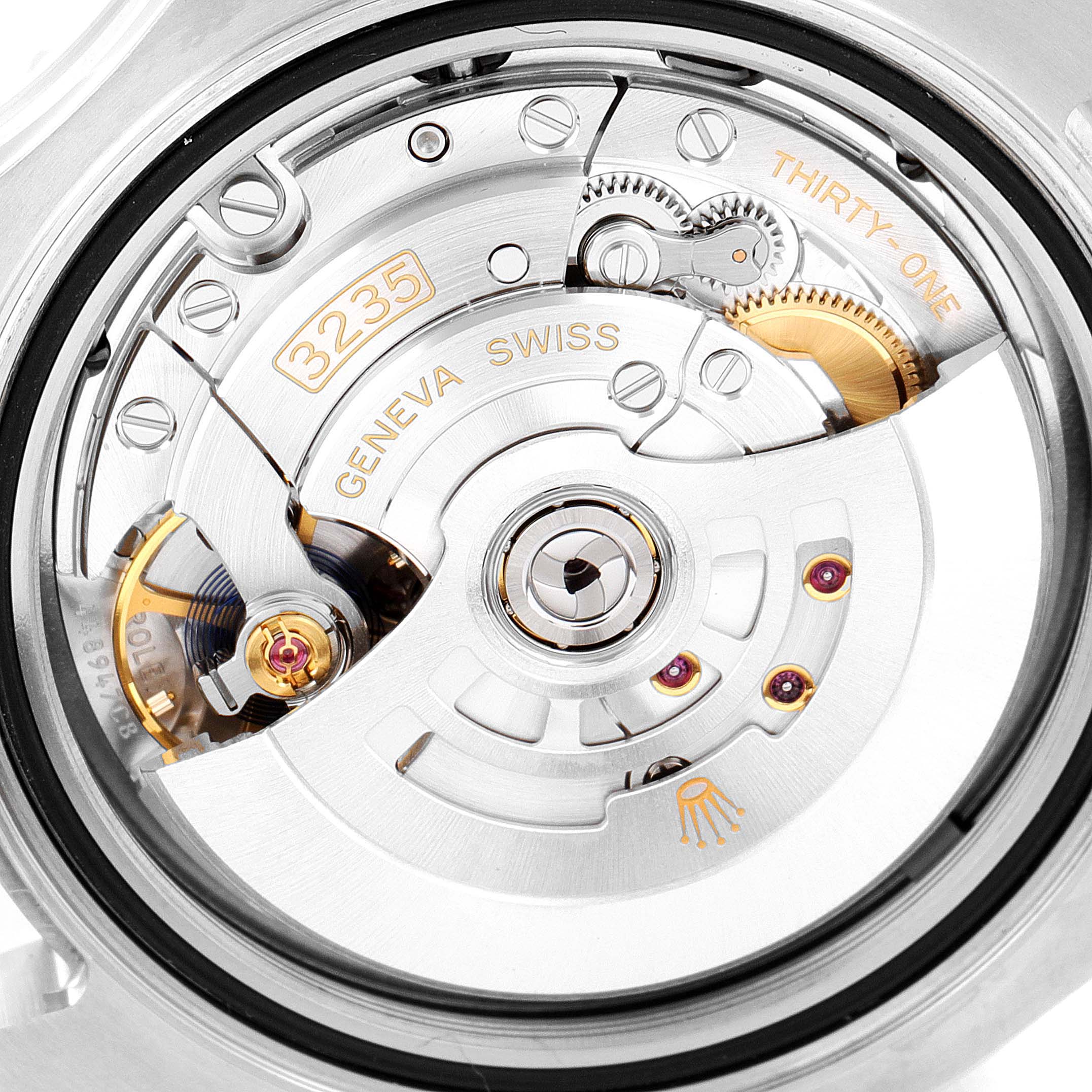 This is a close-up view of the Rolex Yacht-Master 126622 Men's Platinum Grey Dial 126622 Men's Platinum Grey Dial 3235 movement, showcasing its intricate mechanics and engravings.