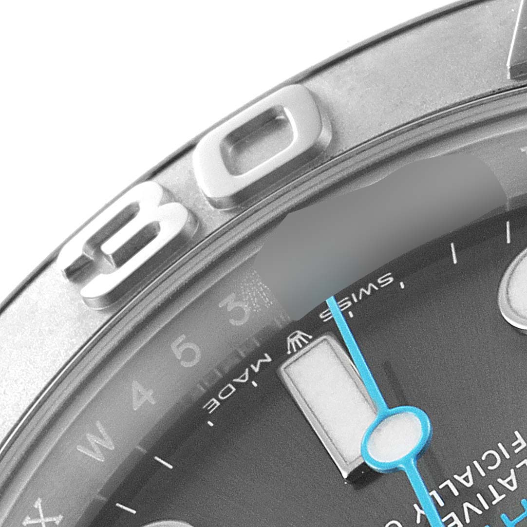 This close-up image of the Rolex Yacht-Master 126622 Men's Platinum Grey Dial 126622 Men's Platinum Grey Dial watch shows the bezel, part of the dial, and the hands.