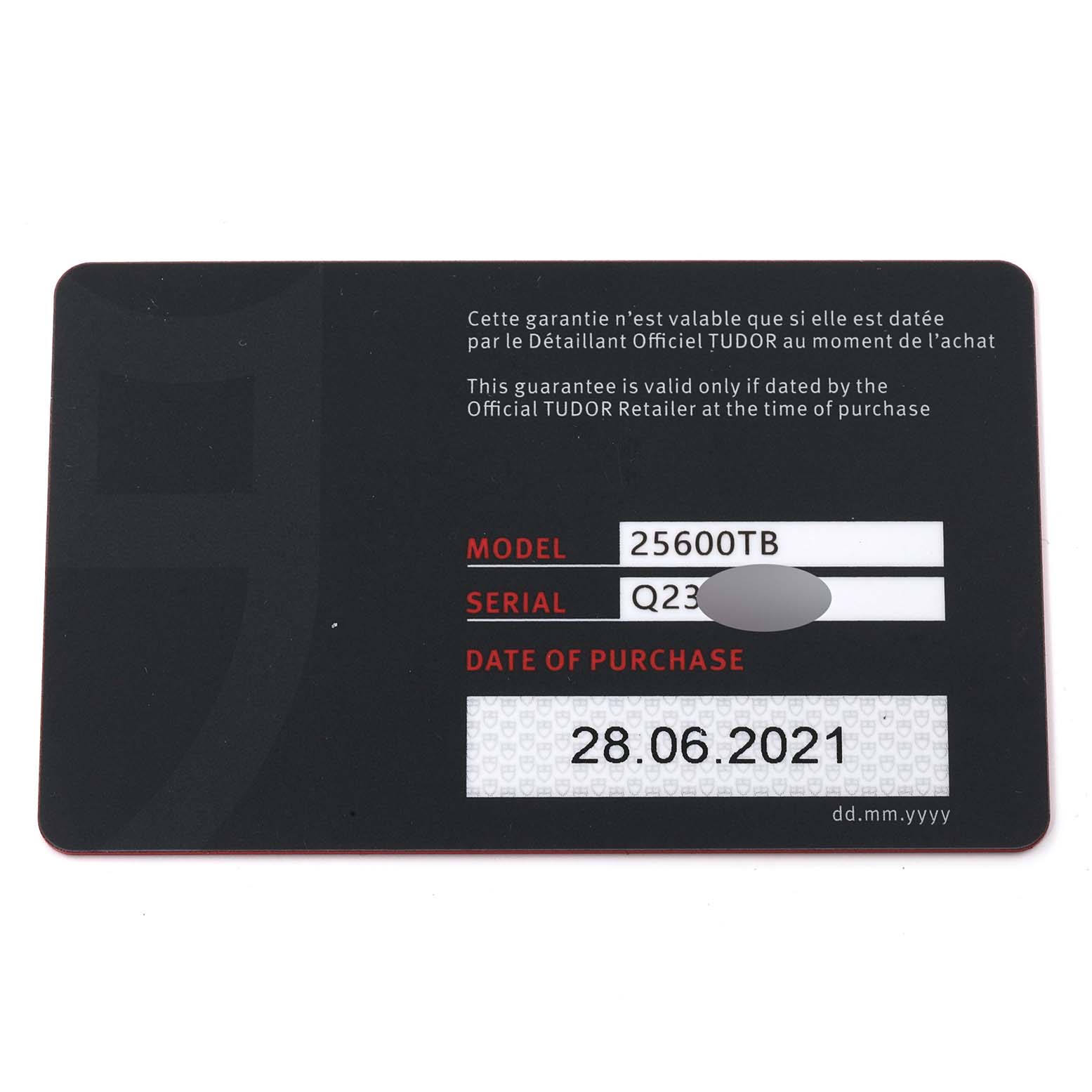 This image shows the warranty card for the Tudor Pelagos 25600TB-0001 Men's Titanium Blue Dial 25600TB-0001 Men's Titanium Blue Dial model, including the model and serial number and the date of purchase.