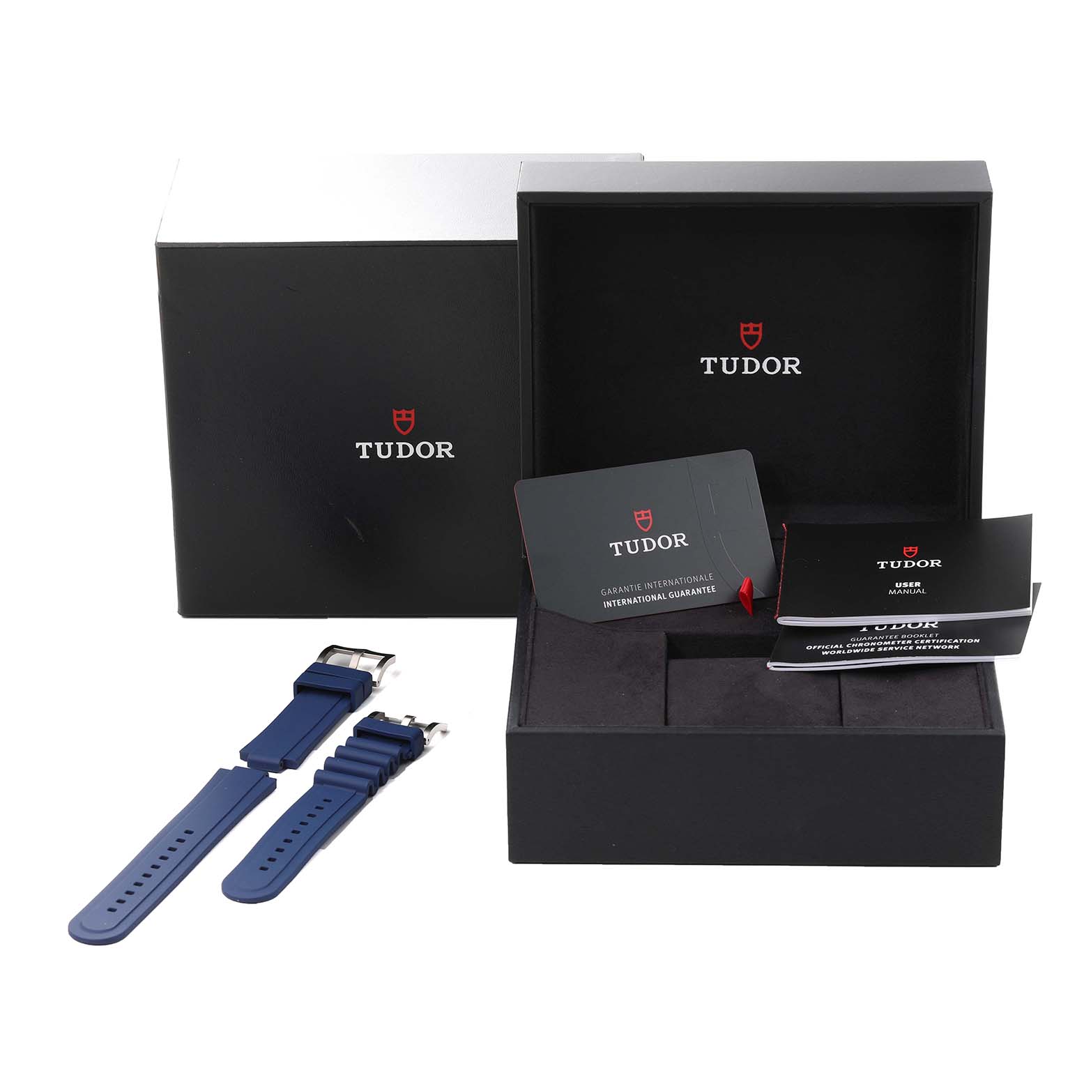 The image shows the Tudor Pelagos 25600TB-0001 Men's Titanium Blue Dial 25600TB-0001 Men's Titanium Blue Dial packaging, including the outer box, inner box, spare rubber straps, warranty card, and user manual.