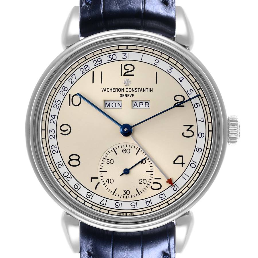 The Vacheron Constantin Historiques watch is shown from a frontal angle, displaying its dial, blue hands, and leather strap.