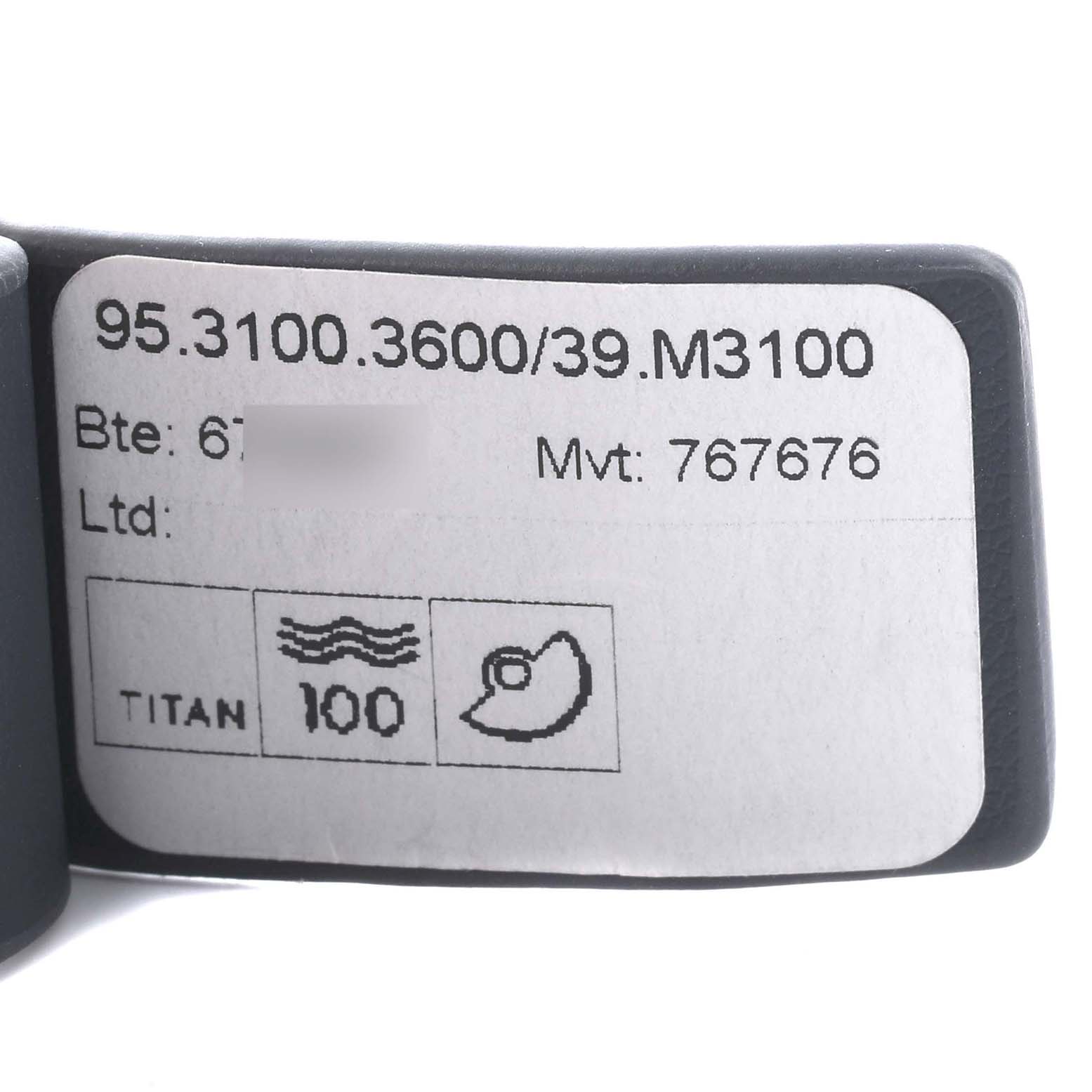 The image shows a product label for the Zenith Chronomaster 95.3100.3600.39.M3100 Men
s Titanium Silver Dial 95.3100.3600.39.M3100 Men
s Titanium Silver Dial, highlighting the model number and specifications.