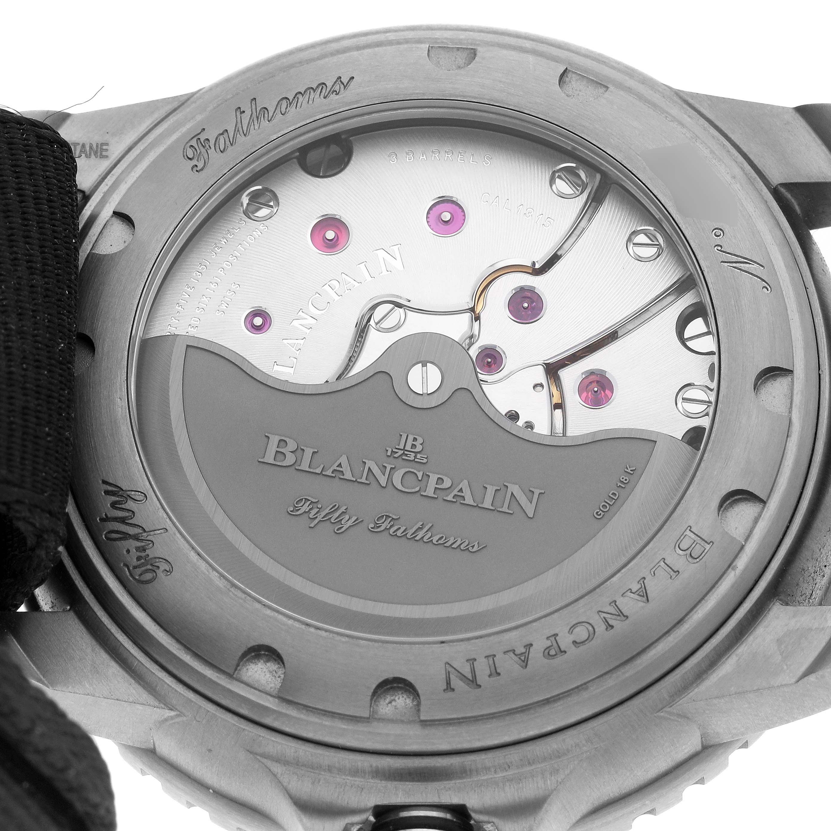 The image shows the back of the Blancpain Fifty Fathoms 5015-12B30 Men's Titanium Black Dial watch, highlighting its movement and branding.