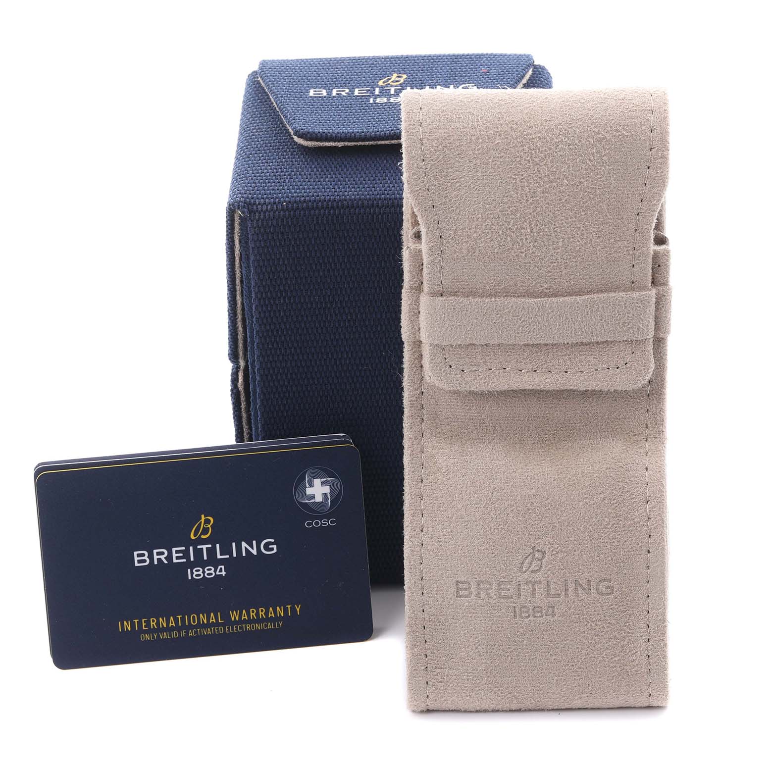 The image shows the Breitling Avenger V32395101B1X1 Men's Titanium Black Dial V32395101B1X1 Men's Titanium Black Dial's packaging, a warranty card, and a suede pouch from a front angle.