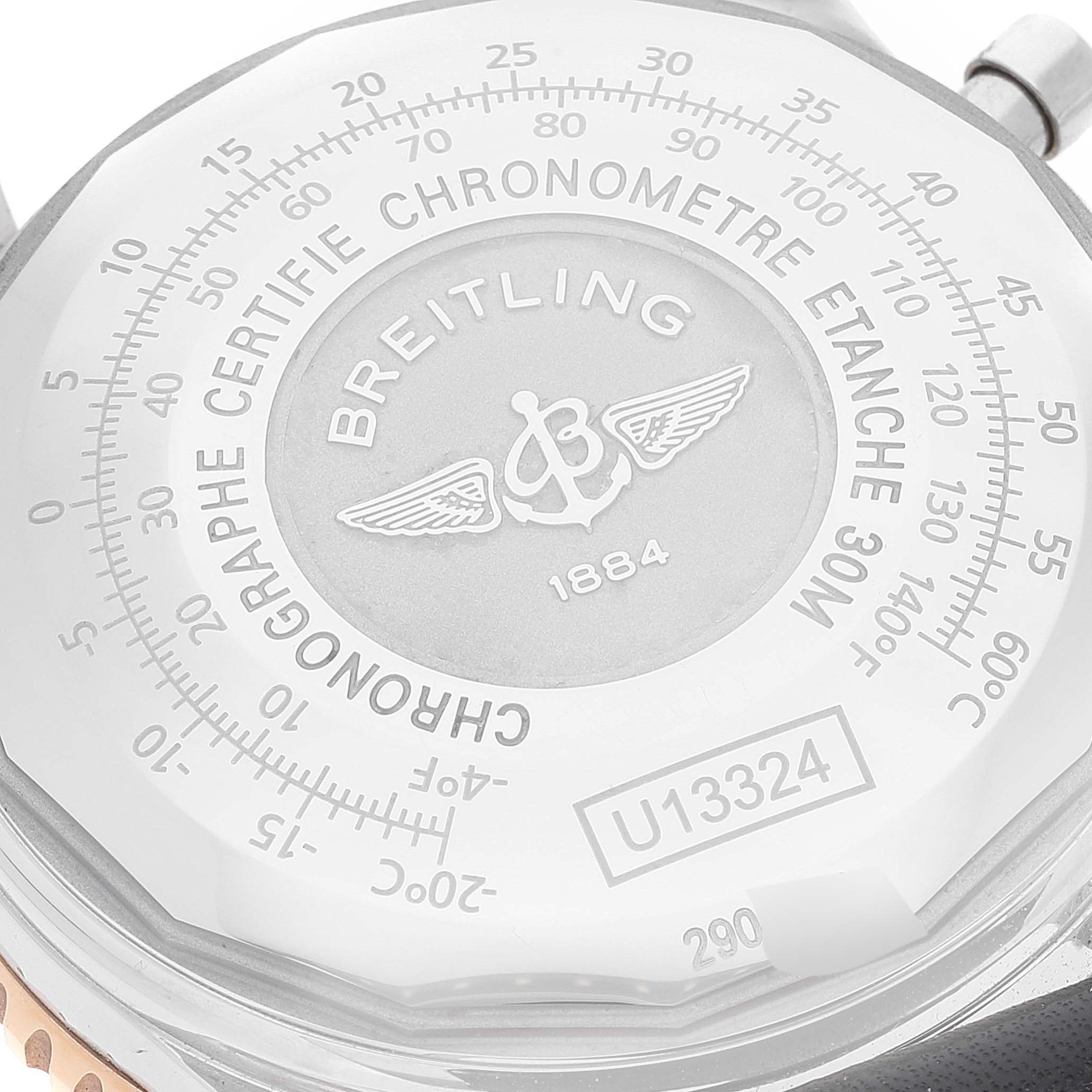 The image shows the back case of a Breitling Navitimer U13324211B1X1 Men
s Steel and Gold (two tone) Black Dial U13324211B1X1 Men
s Steel and Gold (two tone) Black Dial watch, emphasizing the brand logo, model number, and certification engraving.