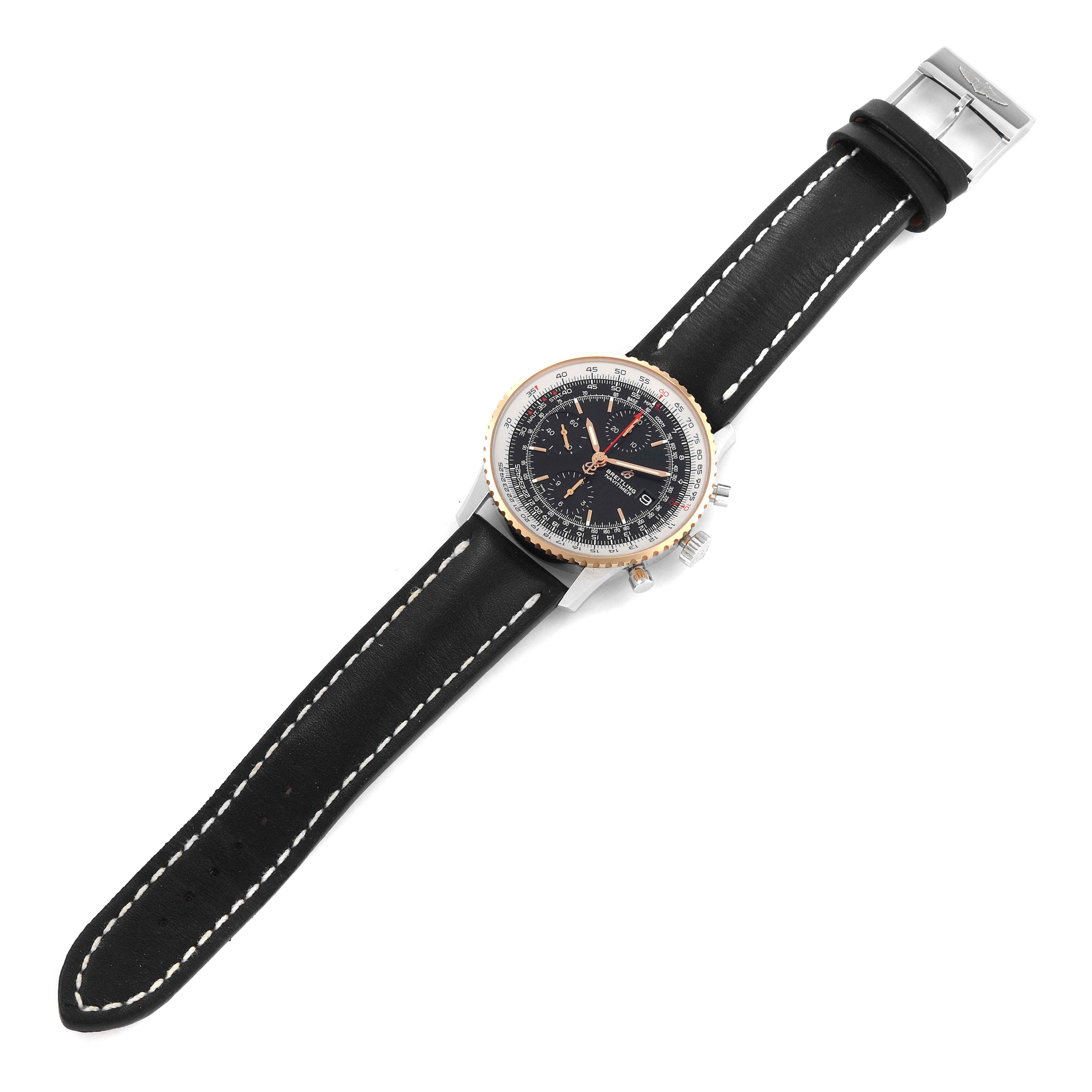 The Breitling Navitimer U13324211B1X1 Men
s Steel and Gold (two tone) Black Dial U13324211B1X1 Men
s Steel and Gold (two tone) Black Dial watch is shown from an overhead angle, displaying its face, bezel, and black leather strap.