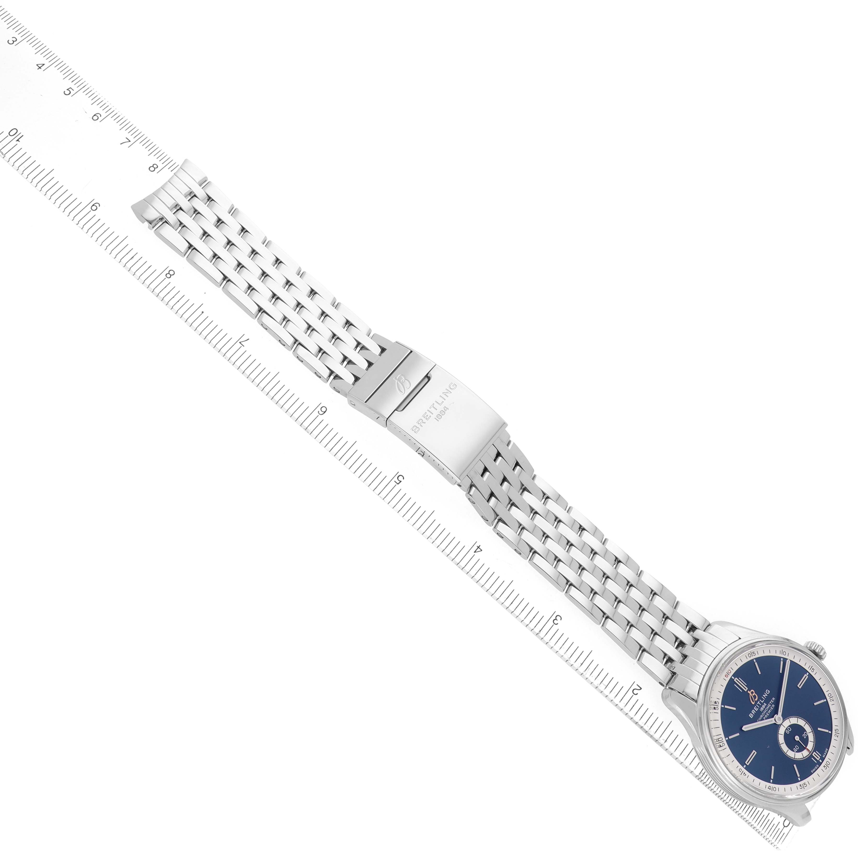 The Breitling Premier A37340 Men's Stainless Steel Blue Dial watch is shown from a top-down angle, displaying its bracelet, clasp, and dial.