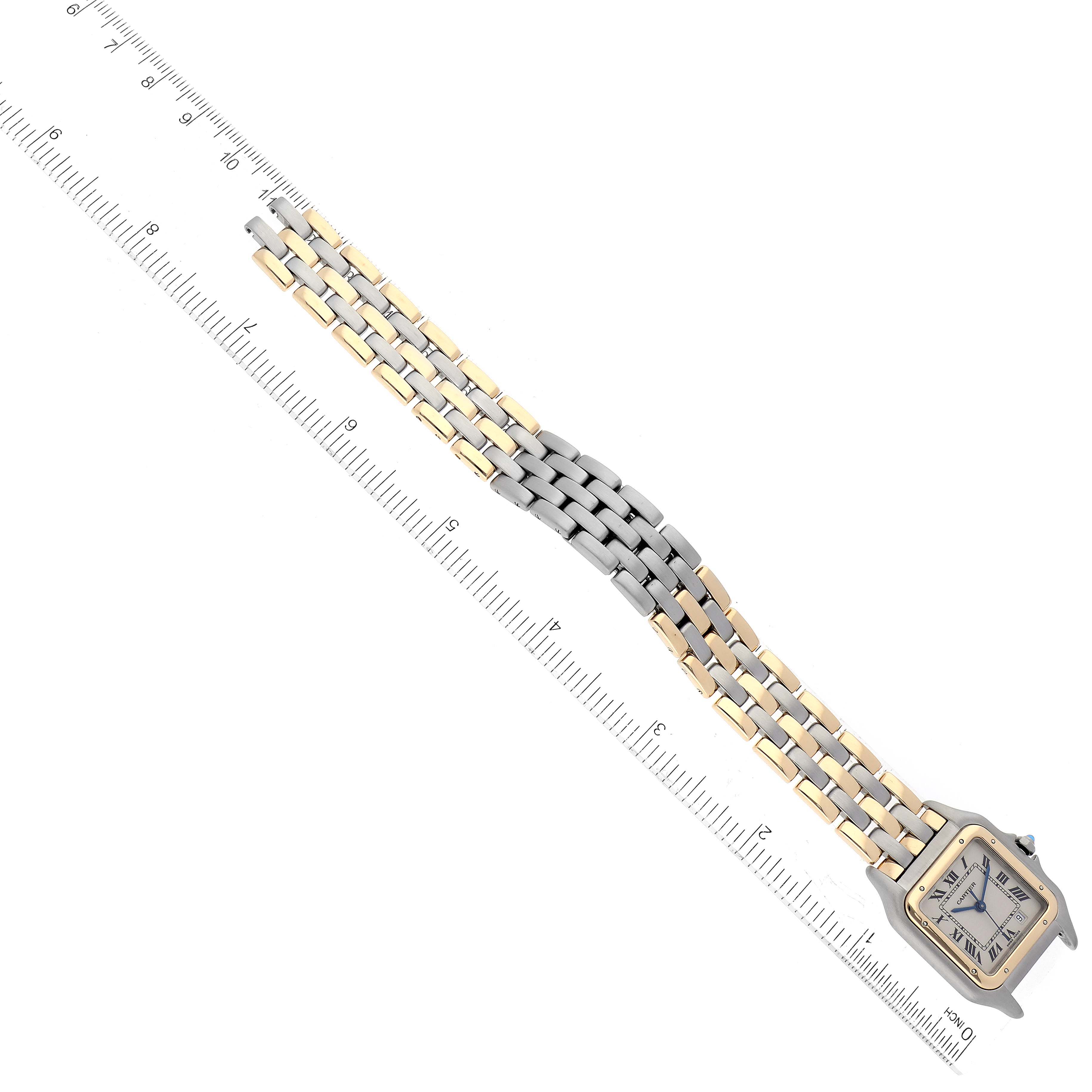 The image shows the front view of a Cartier Panthere 83083244 Women's Steel and Gold (two tone) Silver Dial 83083244 Women's Steel and Gold (two tone) Silver Dial watch with a two-tone metal bracelet, placed alongside a measuring ruler.
