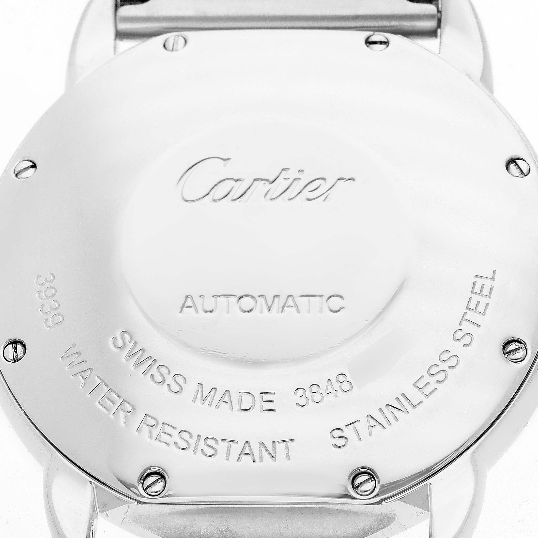 The image shows the back of a Cartier Ronde WSRN0012 Men's Stainless Steel Silver Dial watch, displaying the brand name, model details, and material information.