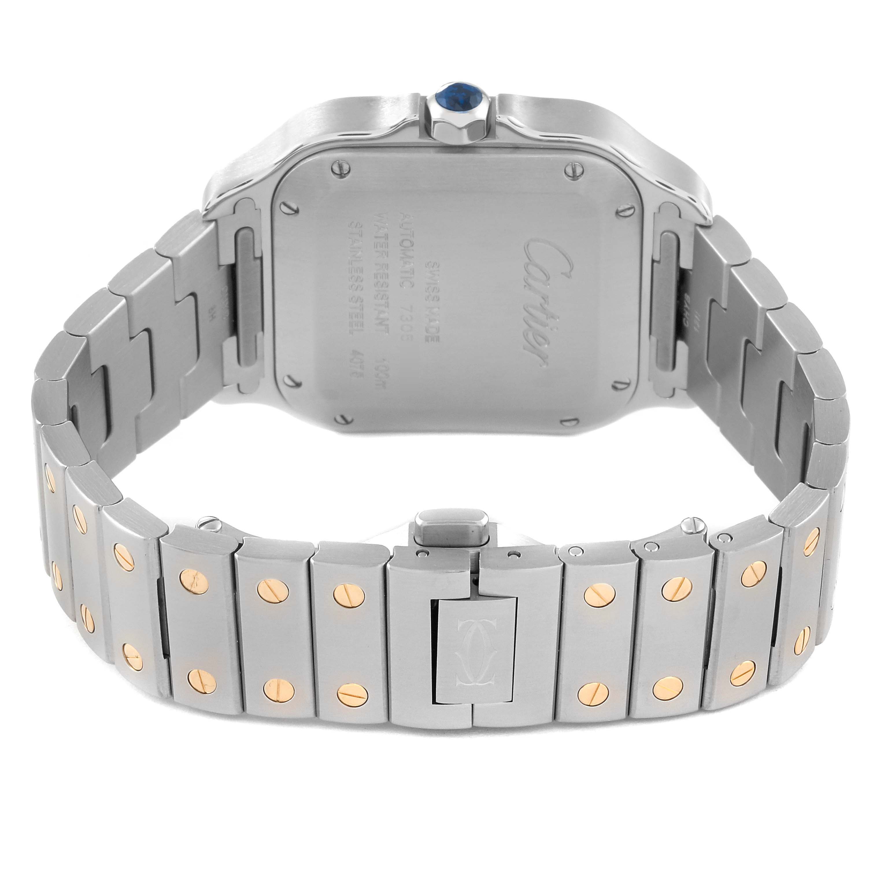 This image shows the back view and bracelet of a Santos model watch by Cartier.
