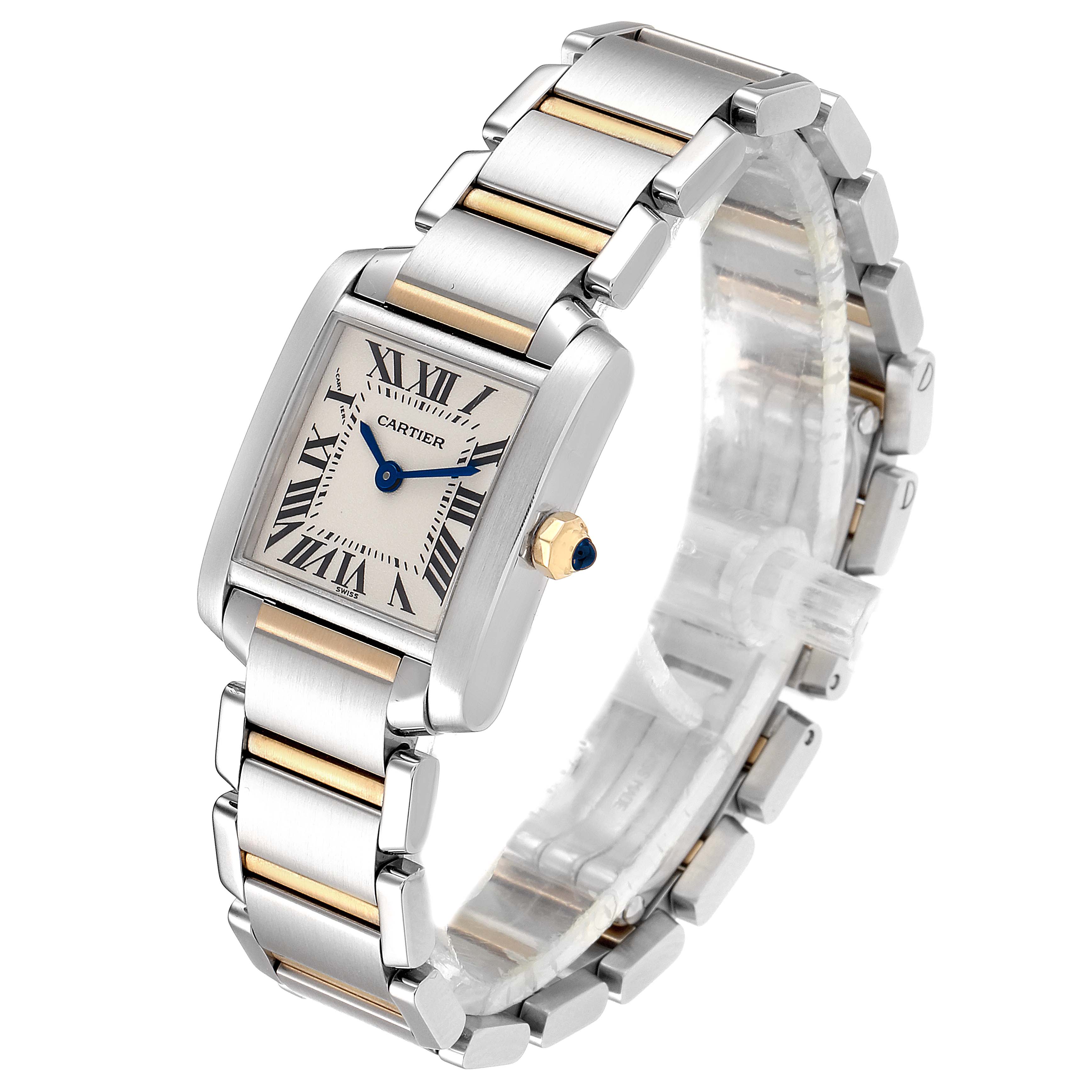 The image shows a Cartier Tank Française watch, highlighting its rectangular face, Roman numerals, blue hands, and gold and steel bracelet.